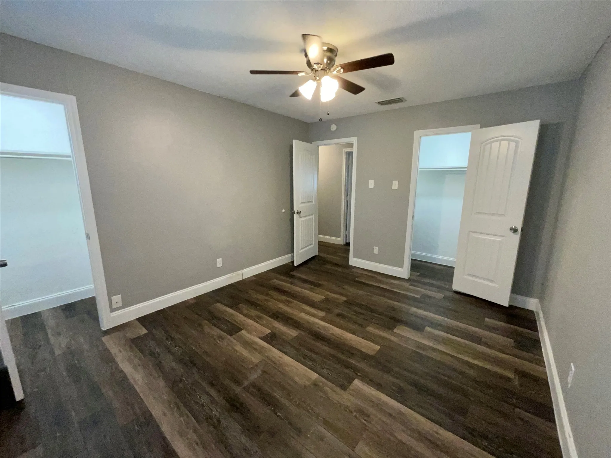 Primary Bedroom with Two Closets, Including Additional Closet in Primary Bath