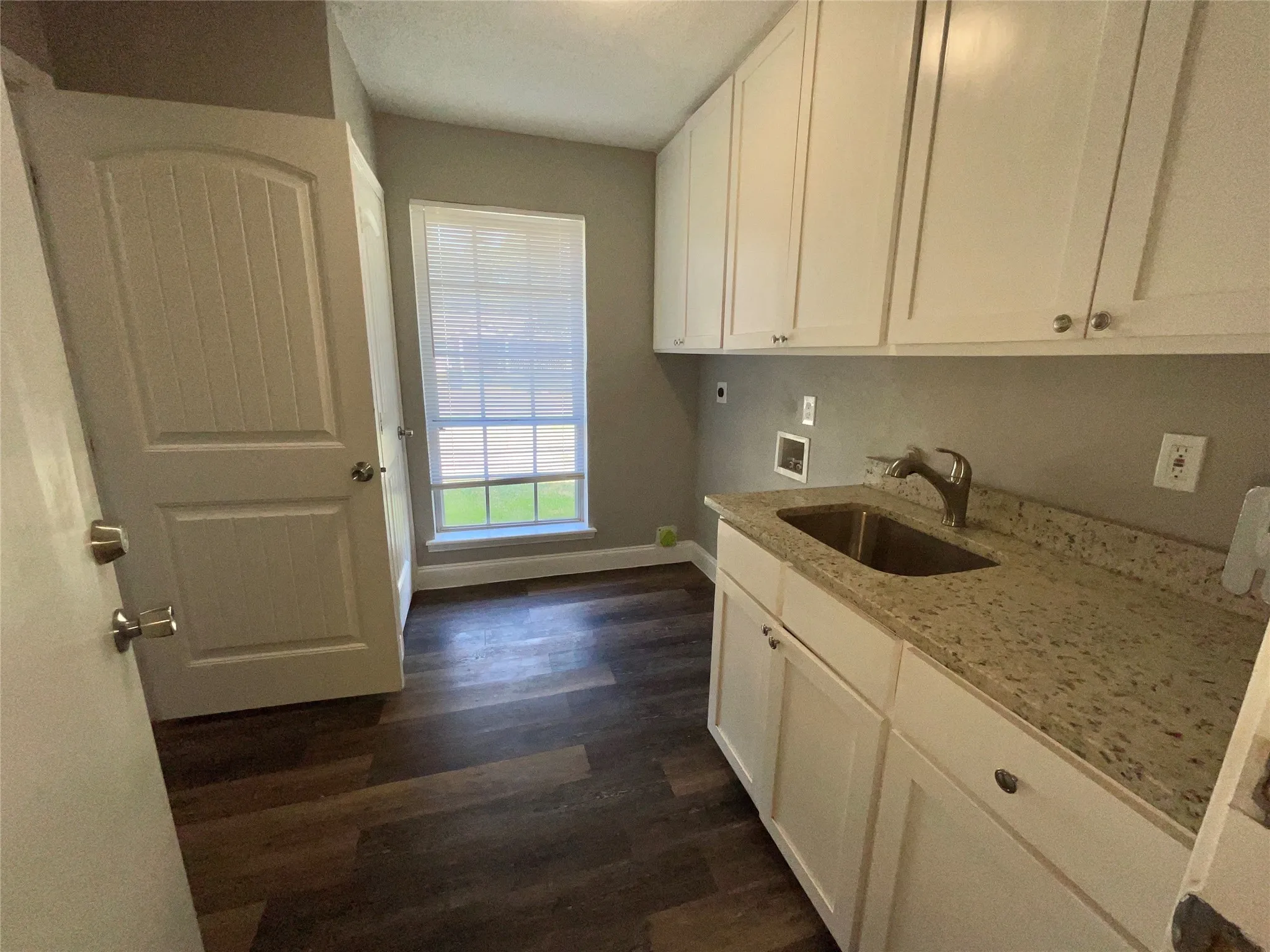 Laundry Room with Utility Sink.