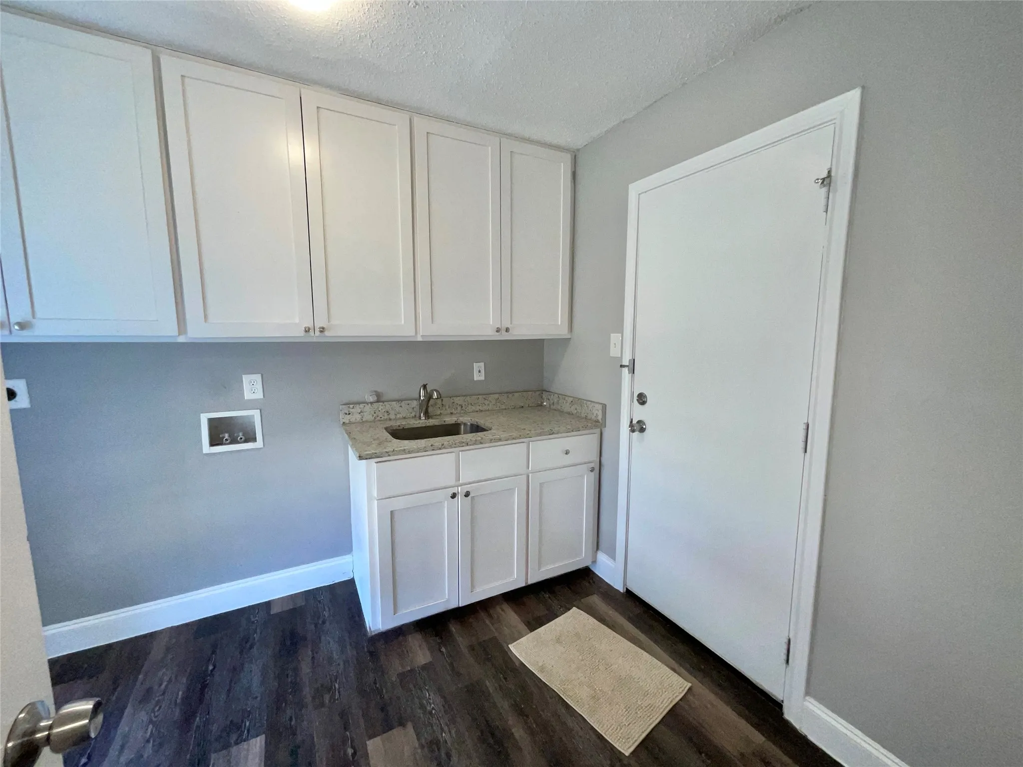 Laundry Room with Utility Sink.