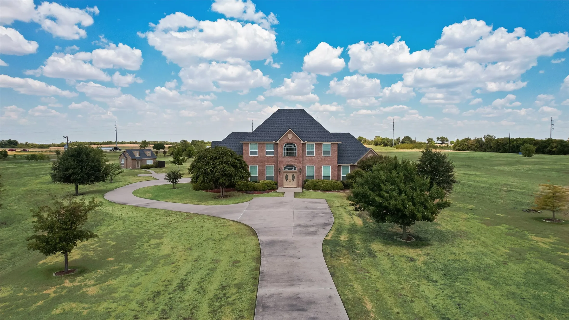 Property does have a 5000 square foot house that will convey with the property. This is a Commercial Sale only. There will be no showings on the interior of the home.