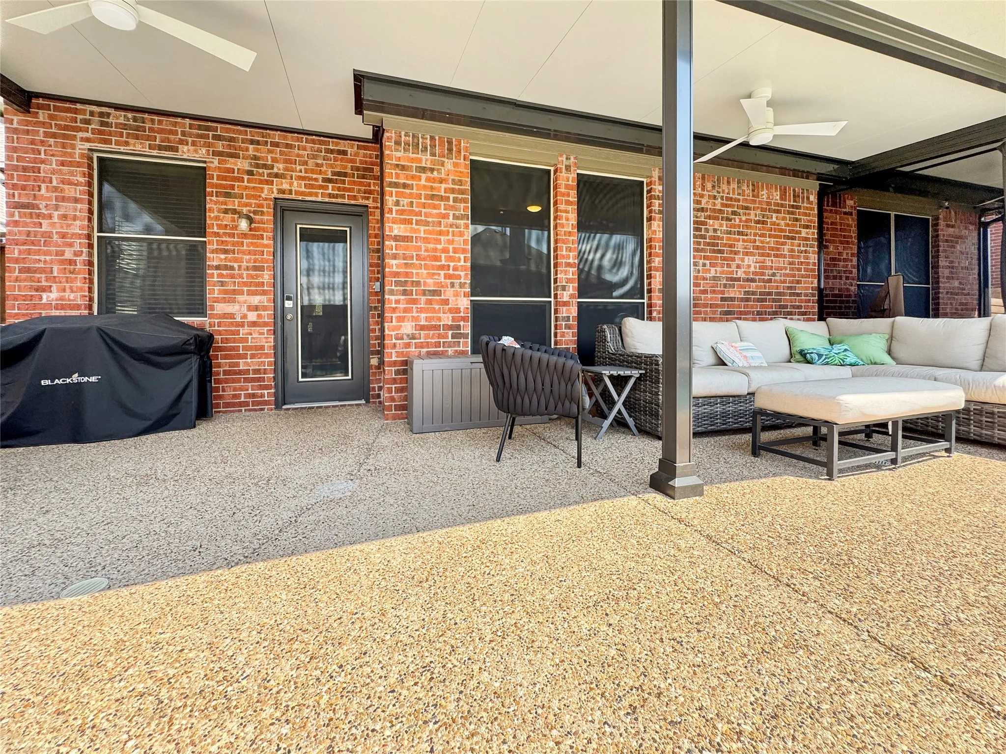 Large Covered back yard patio overlooking the pool