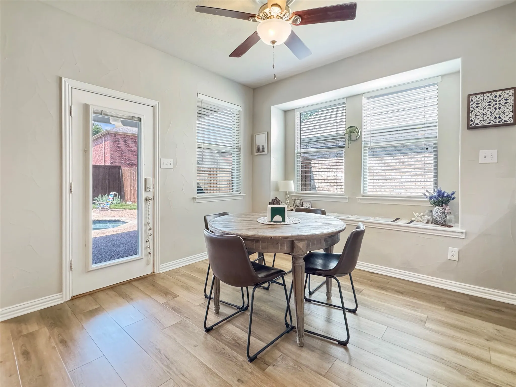 Breakfast area with lots of natural light lookin over the back yard