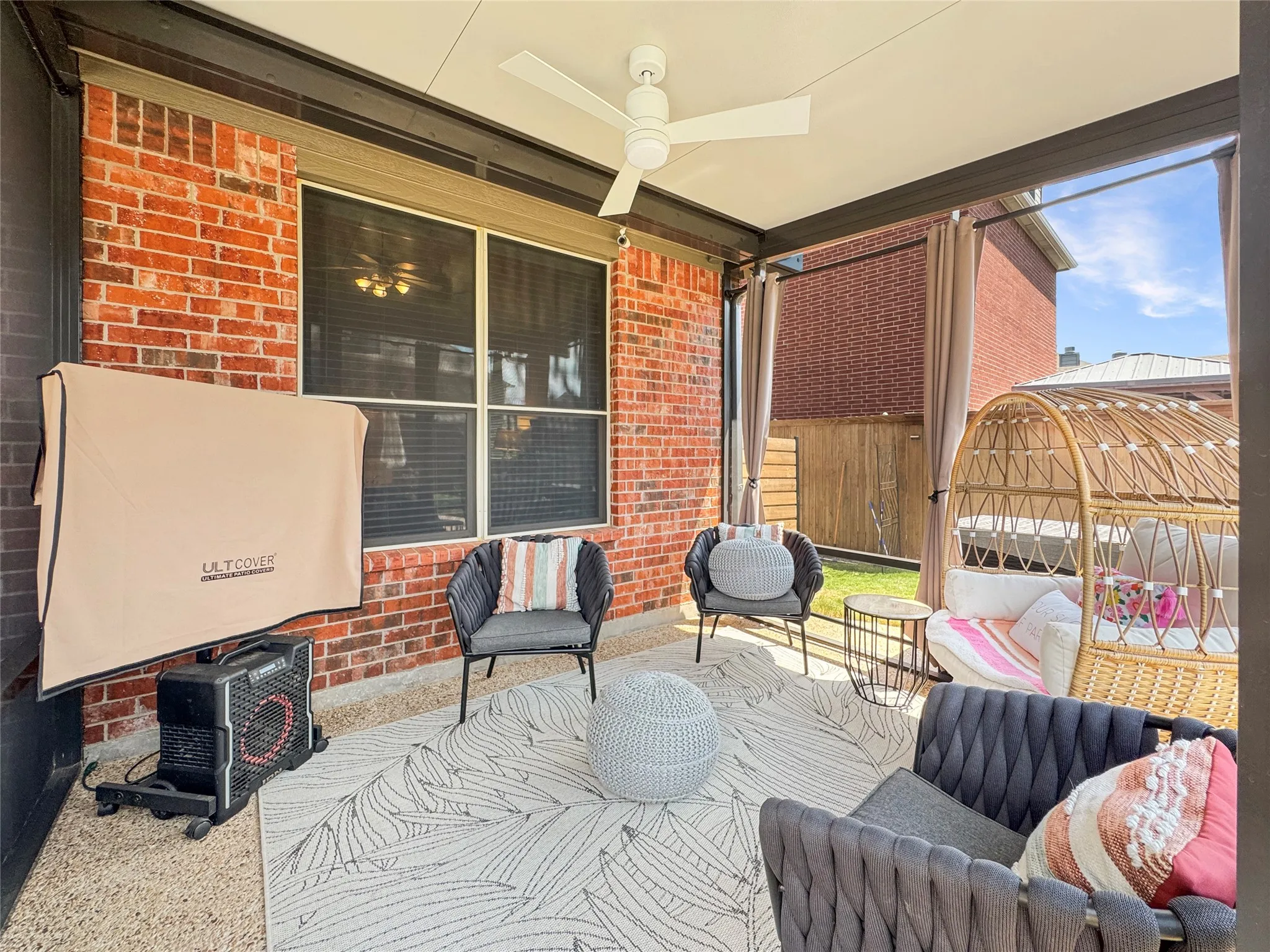 Screened in Covered Patio great for enjoying the backyard with protection from the sun