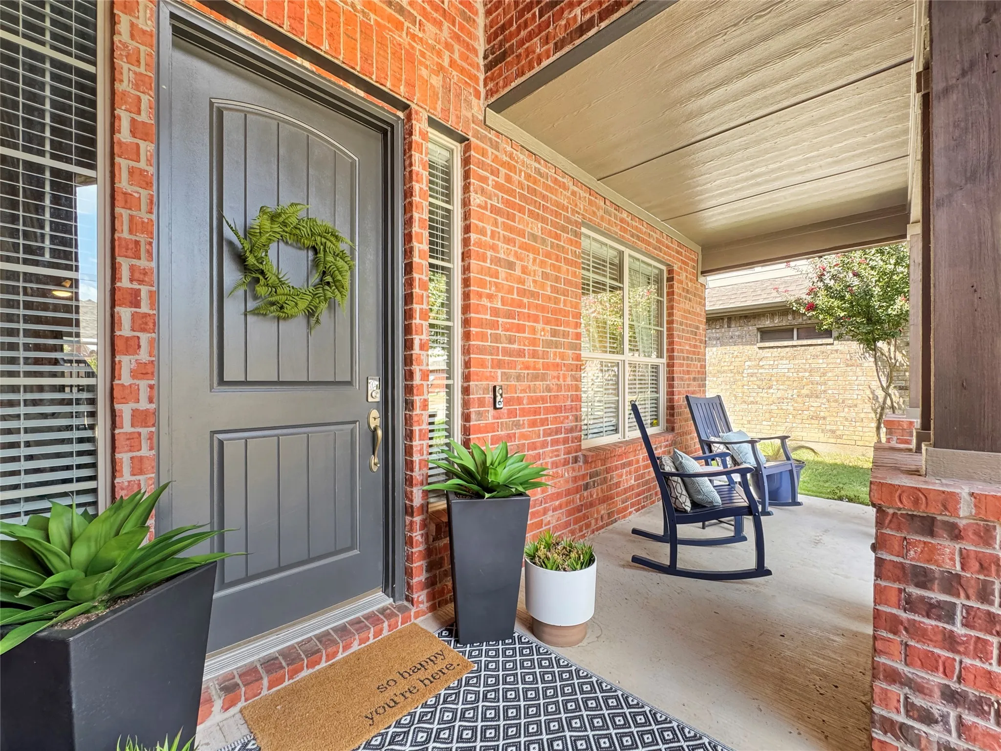 Front covered entry and porch great for relaxing