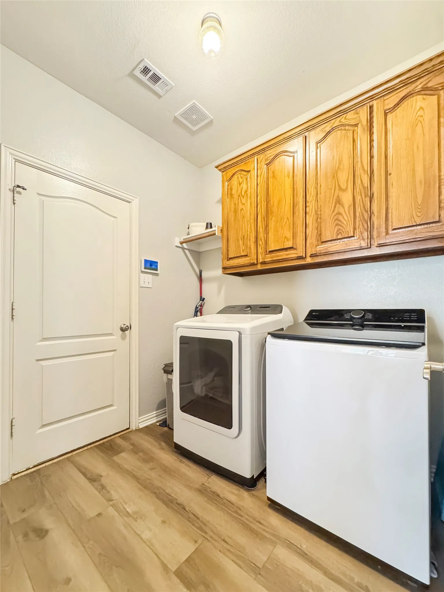 Built in cabinetswith space to hang clothes