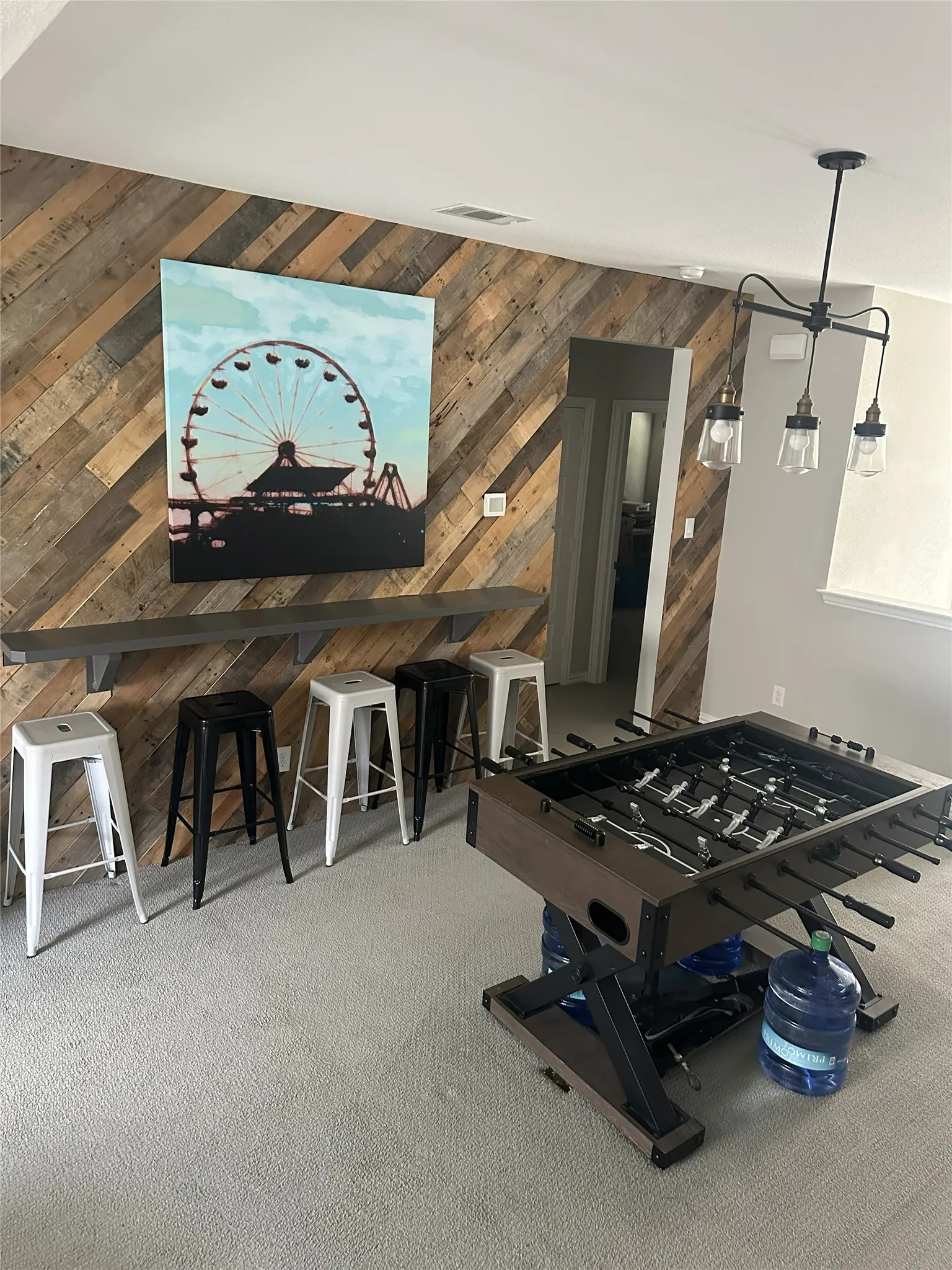 Accent wall featuring diagonal wood paneling