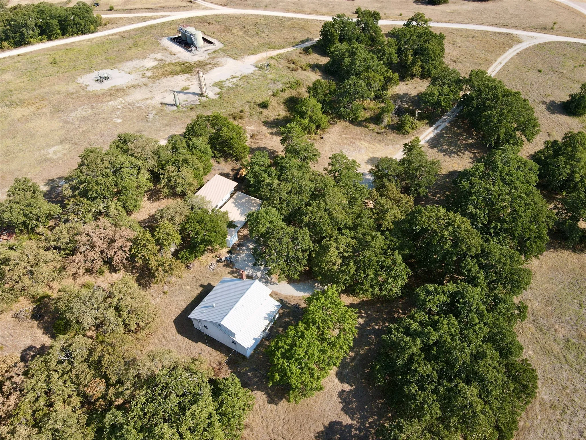 Aerial view of House and garage facing south