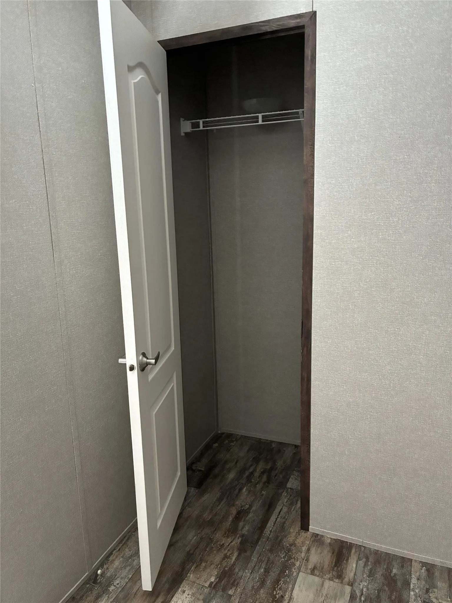 White paneled door with brushed nickel hardware