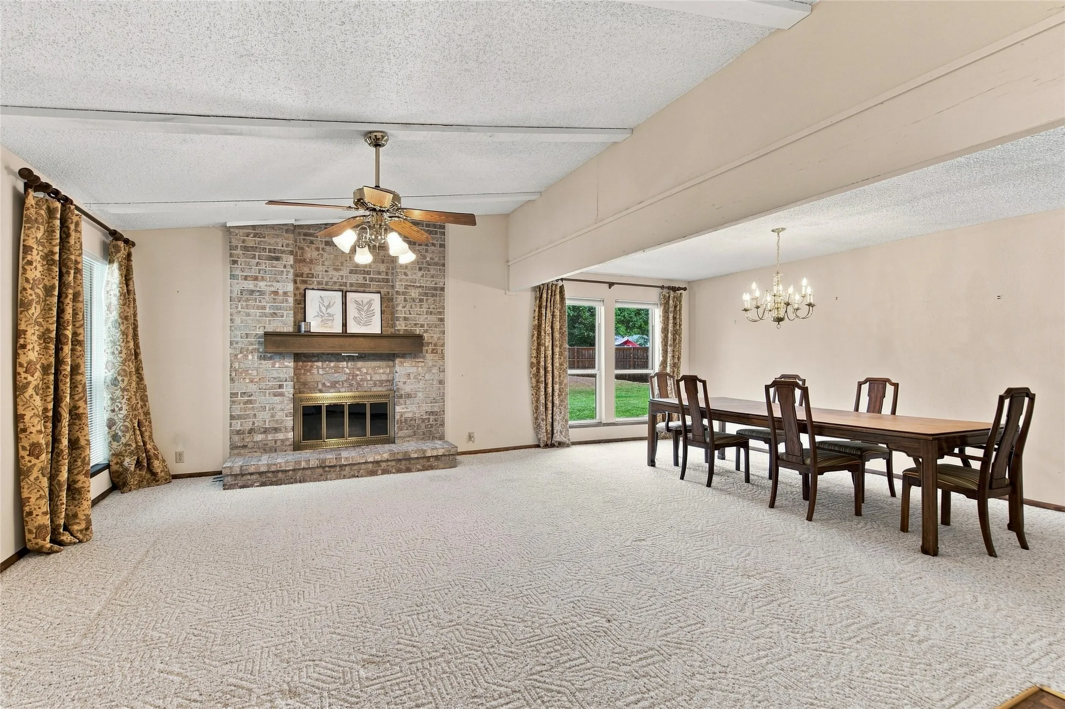 Living and dining area, nice open space with fireplace
