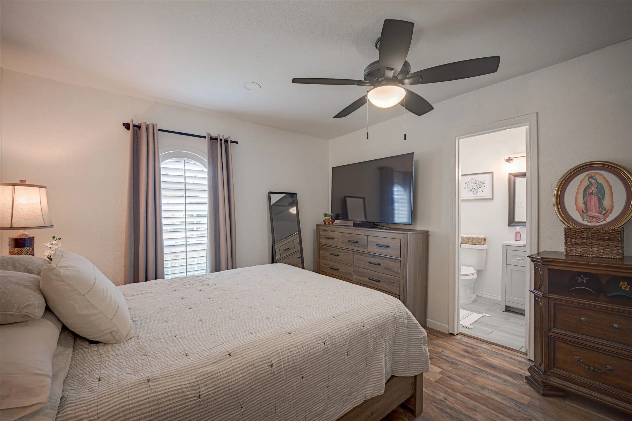 Primary bedroom is generous sized and can accommodate a king size bed!