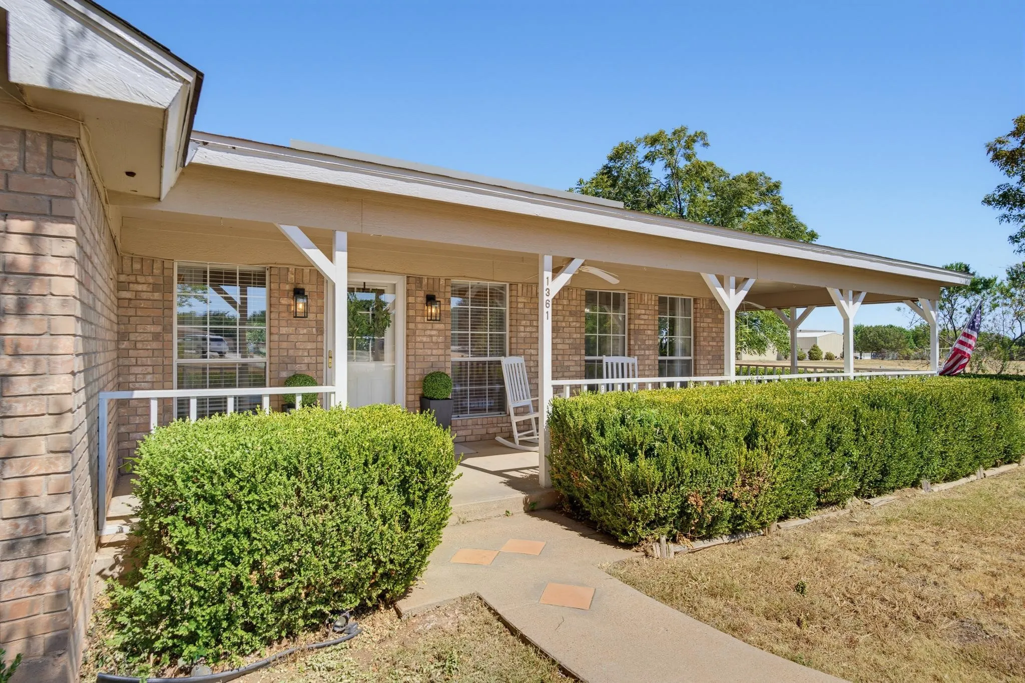 Brick exterior with an expansive covered porch