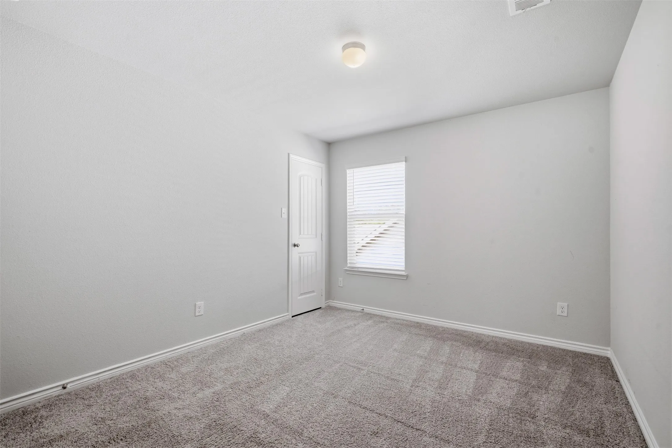 Upstairs bedroom #2 at 8020 Flora Drive listed by Seth Fowler of Williams Trew Real Estate