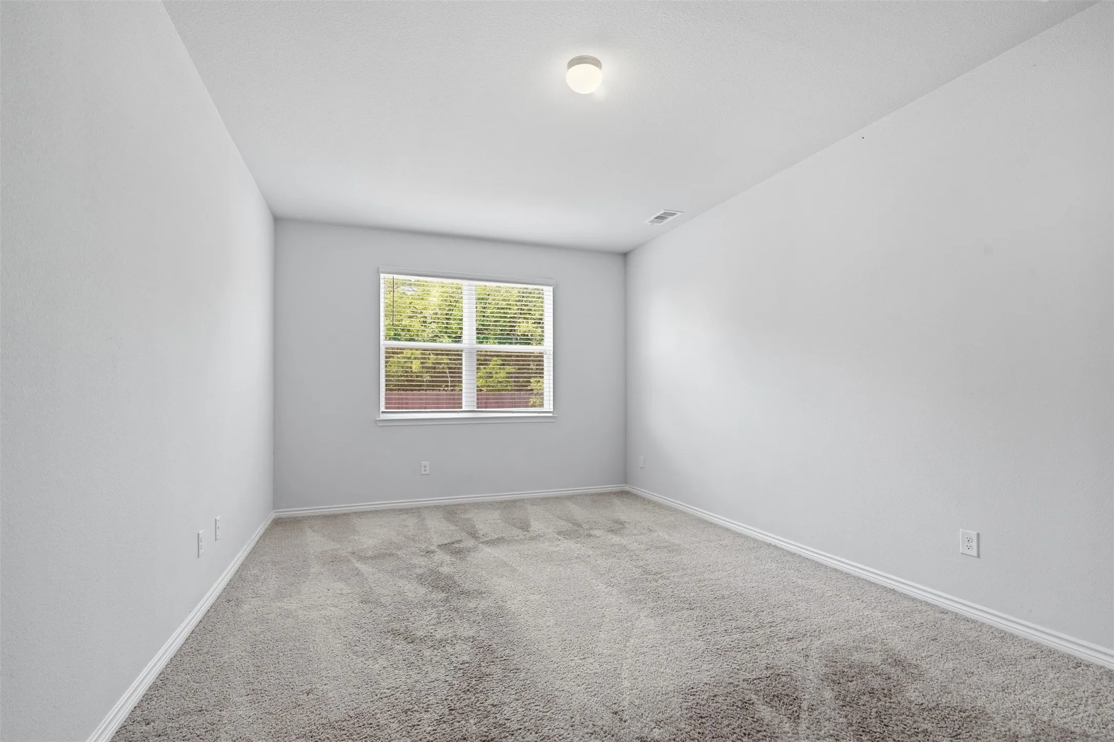 Large master primary bedroom at 8020 Flora Drive listed by Seth Fowler of Williams Trew Real Estate