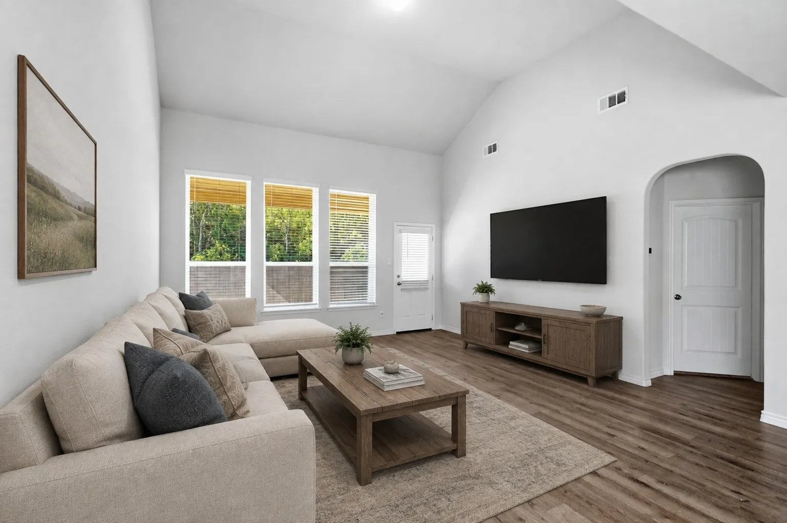 Elevated ceilings, great natural light overlooking the green space behind the home at 8020 Flora Drive listed  by Seth Fowler of Williams Trew Real Estate