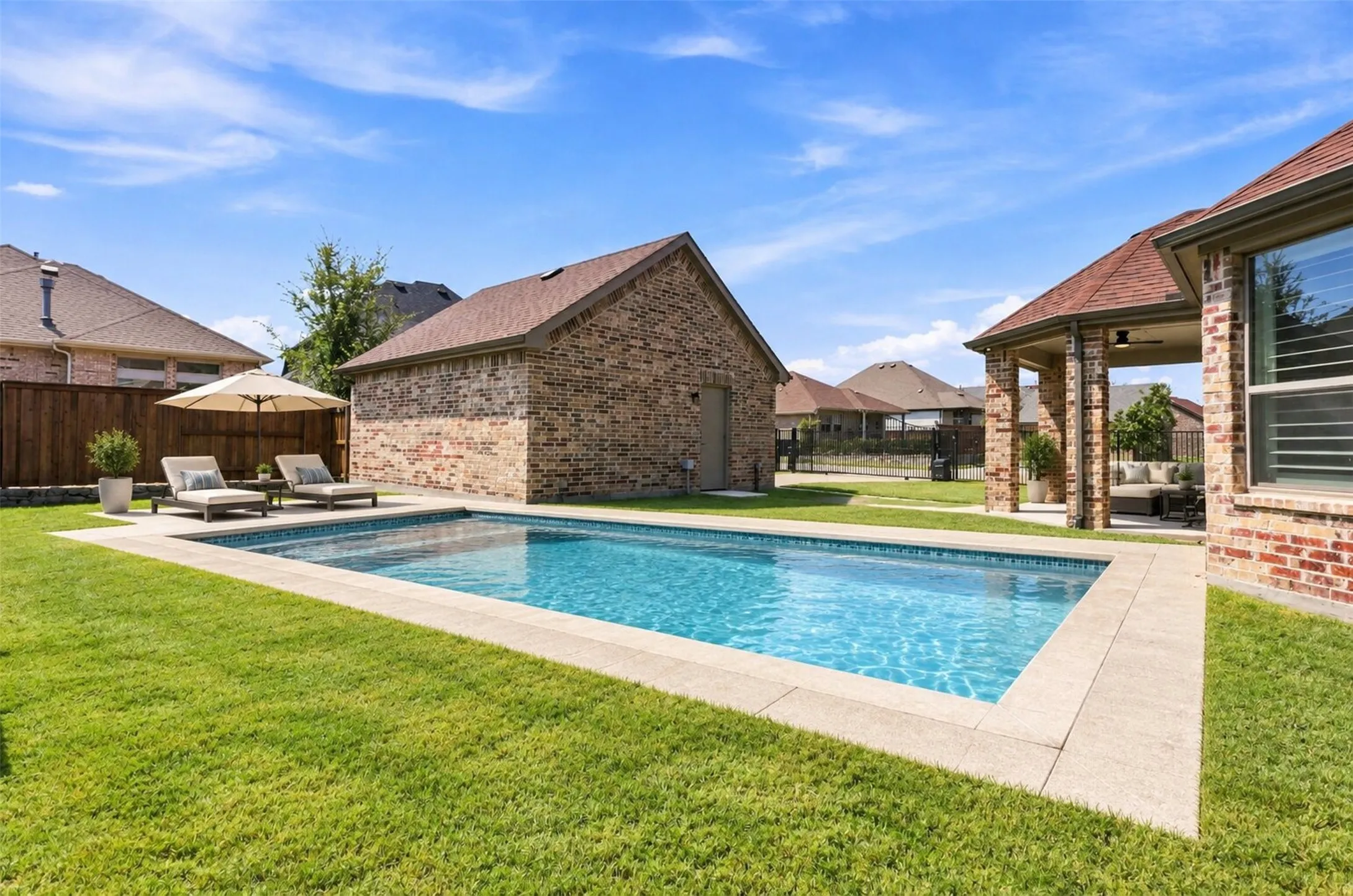 VIRTUALLY STAGED WITH A POOL