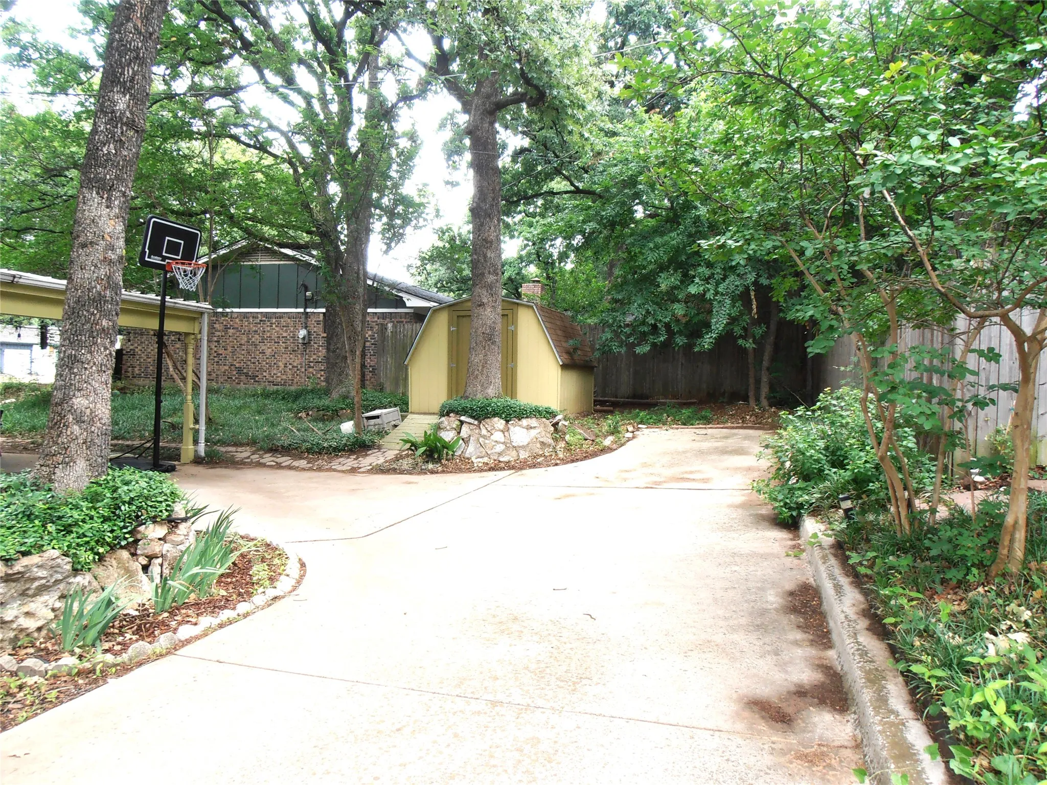 Driveway to backyard area