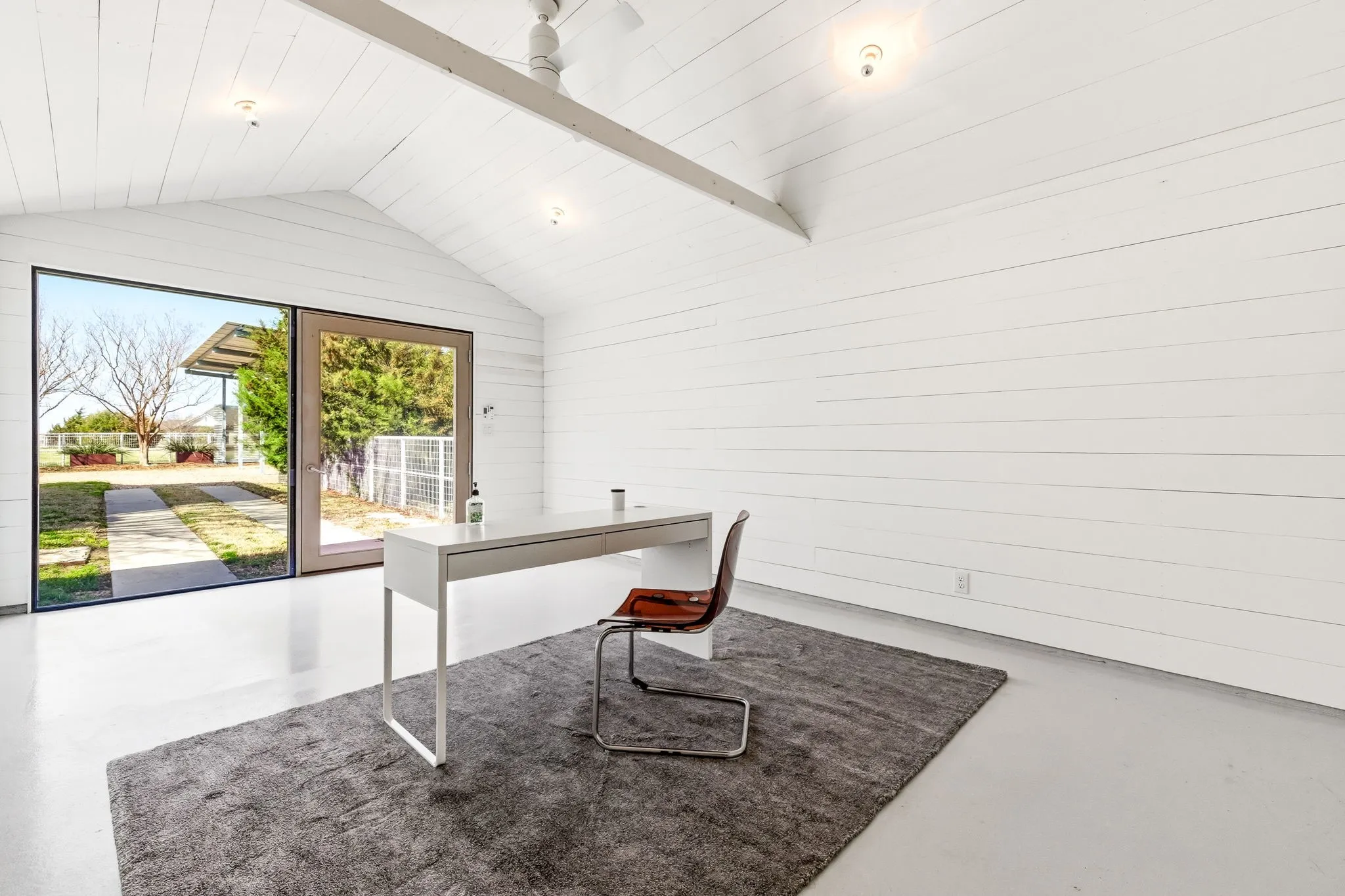 312-sq-ft ADU finished with shiplap walls, mini-split HVAC, and custom door and window detailing.