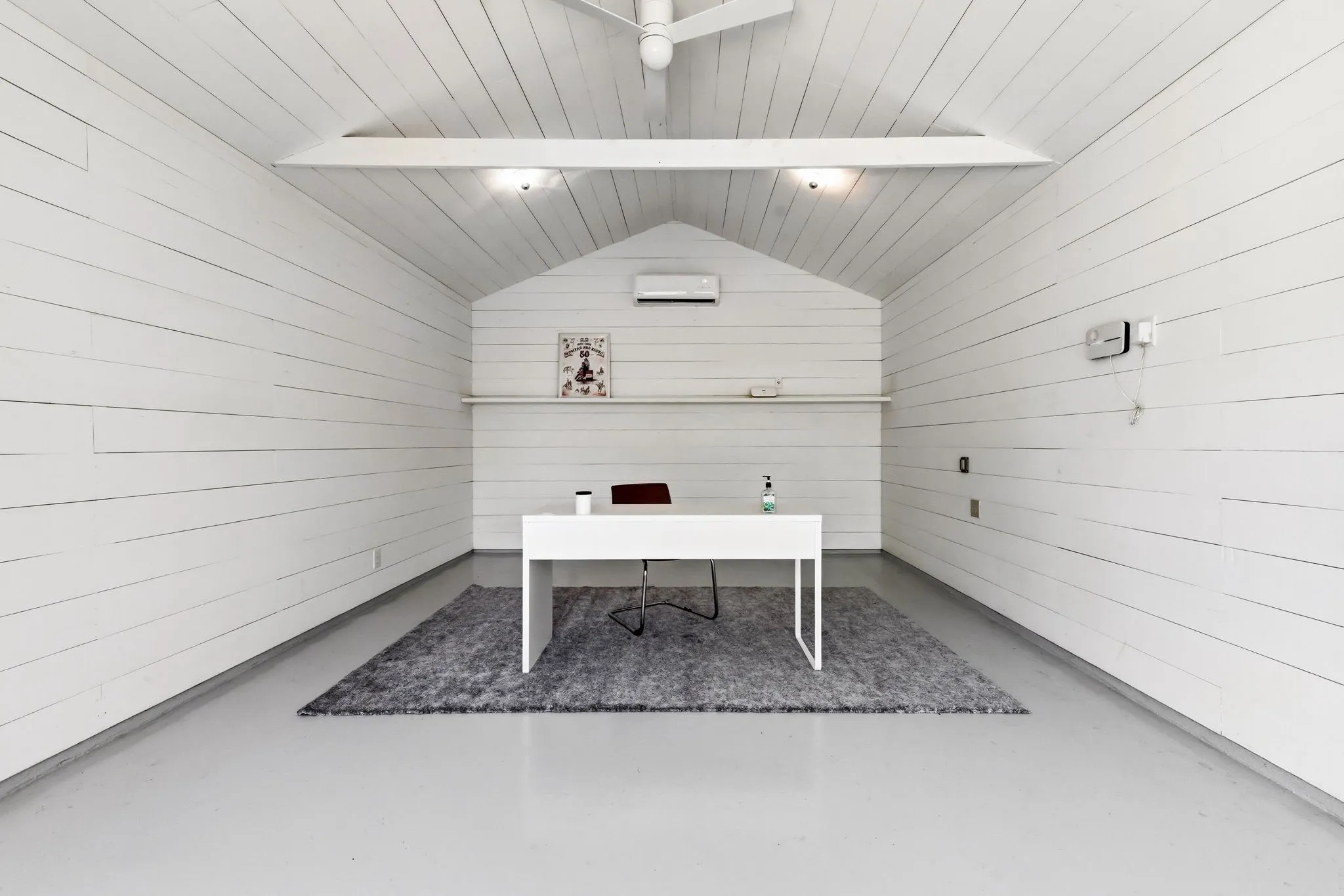312-sq-ft ADU finished with shiplap walls, mini-split HVAC, and custom door and window detailing.
