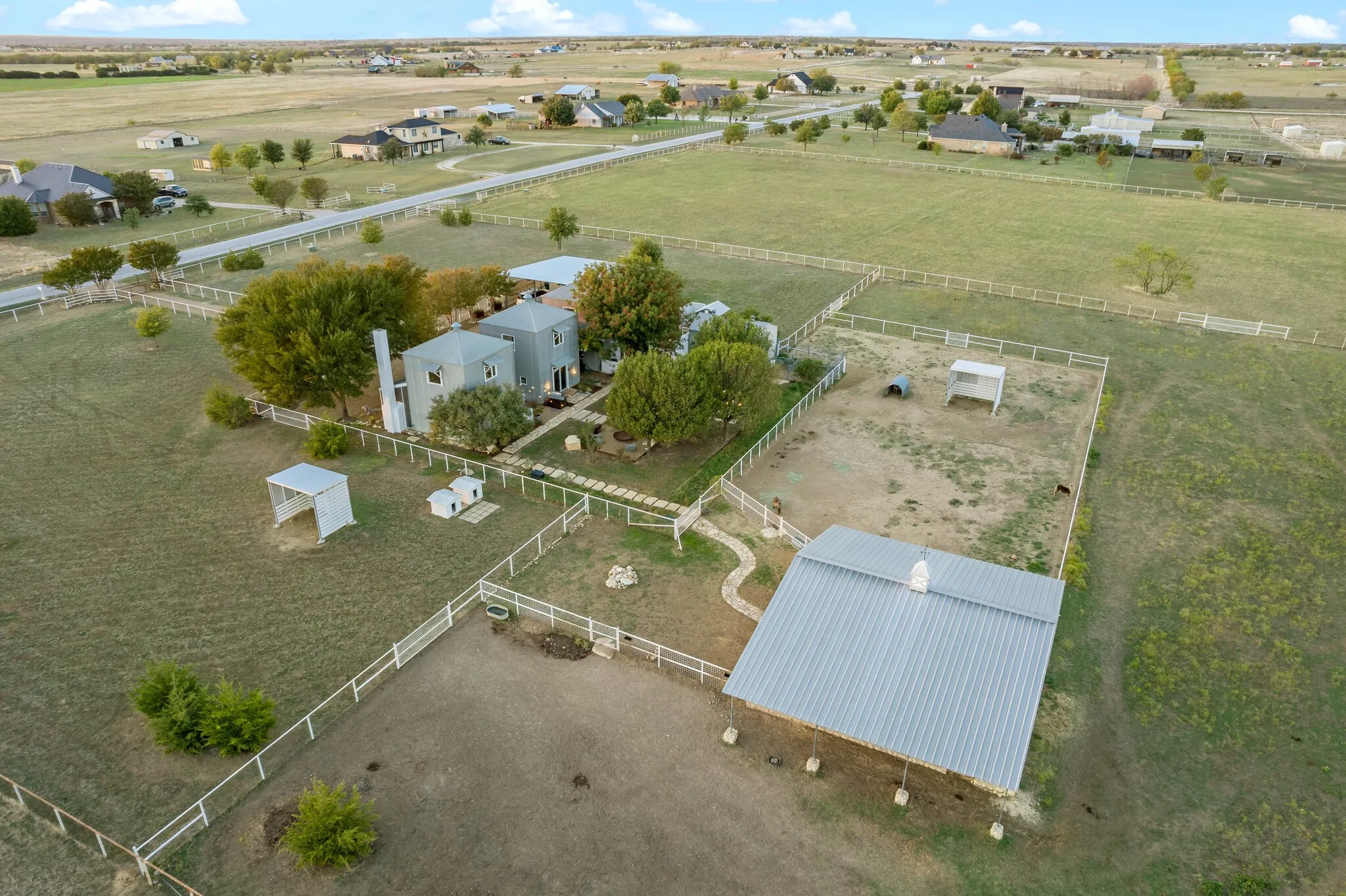 High-end pipe and no-climb fencing installed around entire property. Cross-fenced for animal and pasture management.
