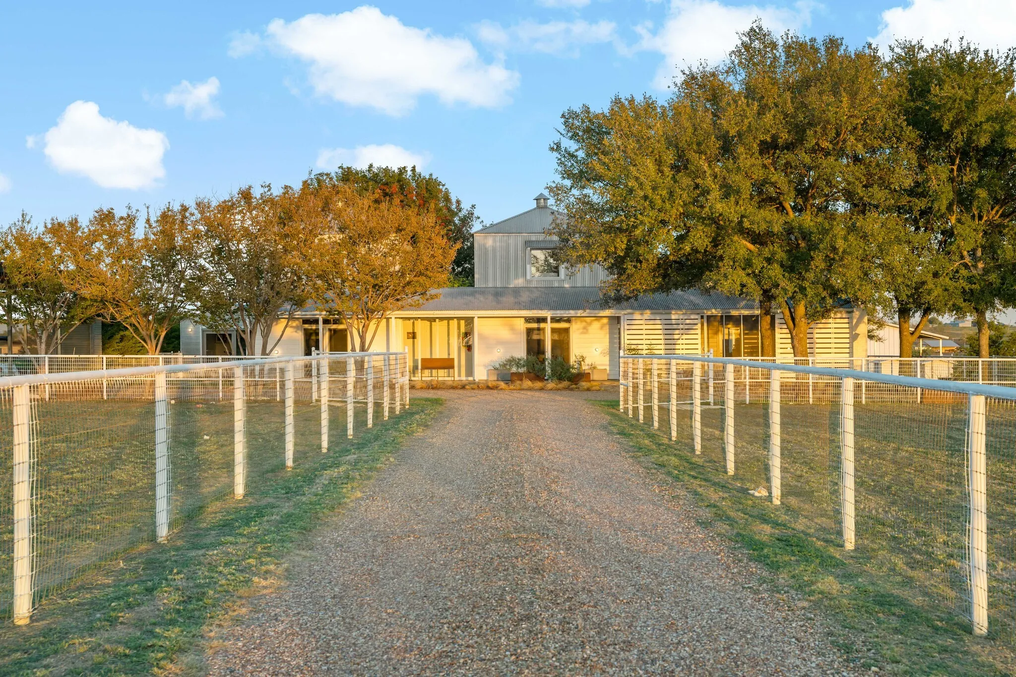 Gravel driveway leading to the residence