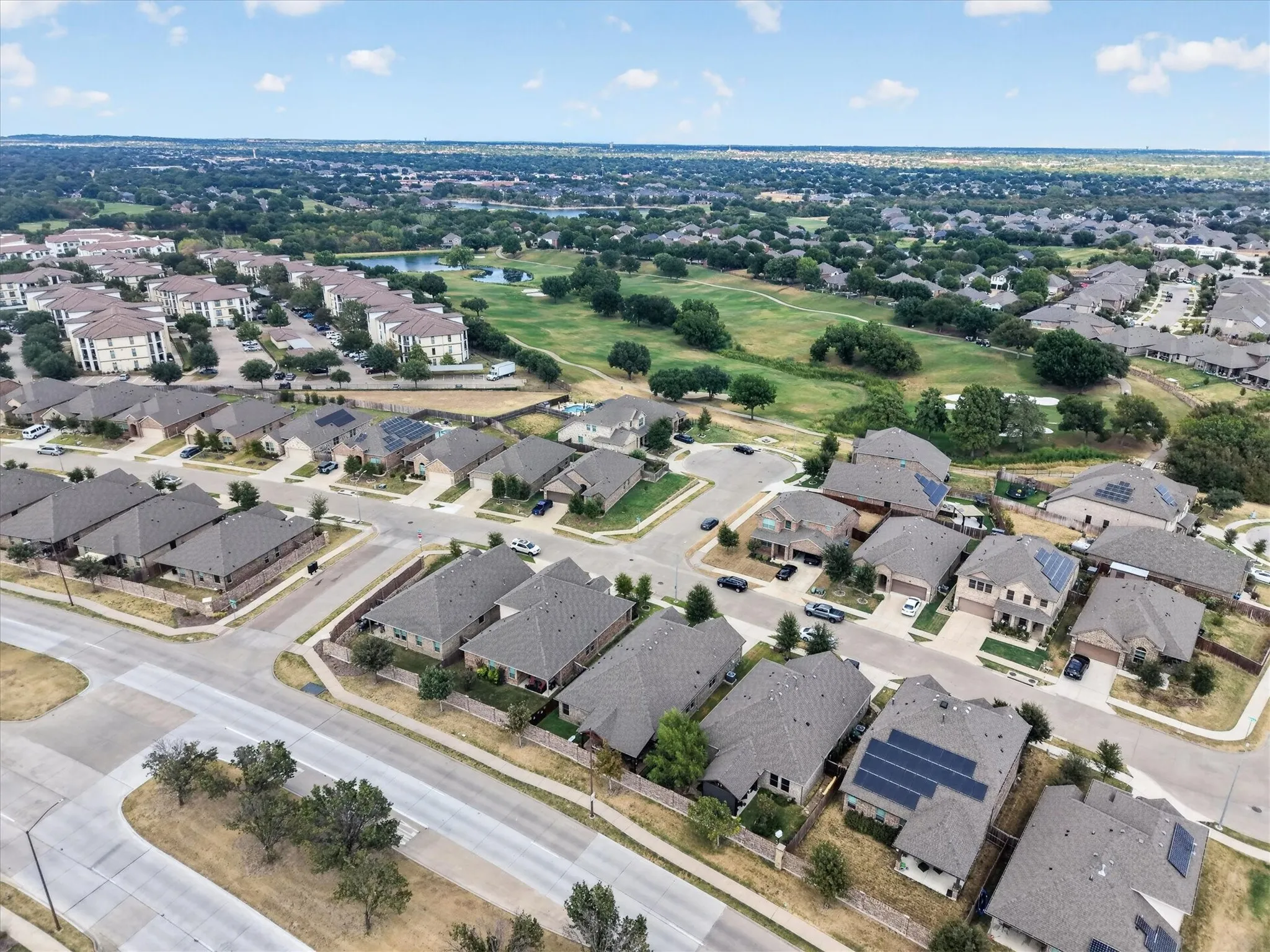 Residential neighborhood featuring single-family homes and multi-family buildings
