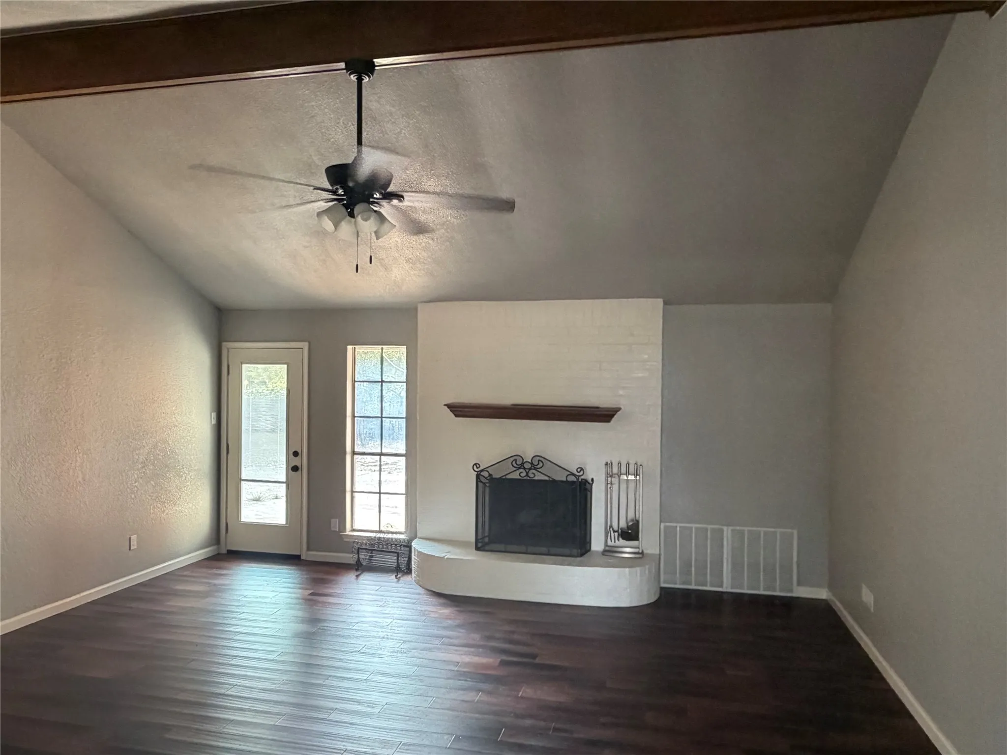 Vaulted ceiling with exposed wood beams