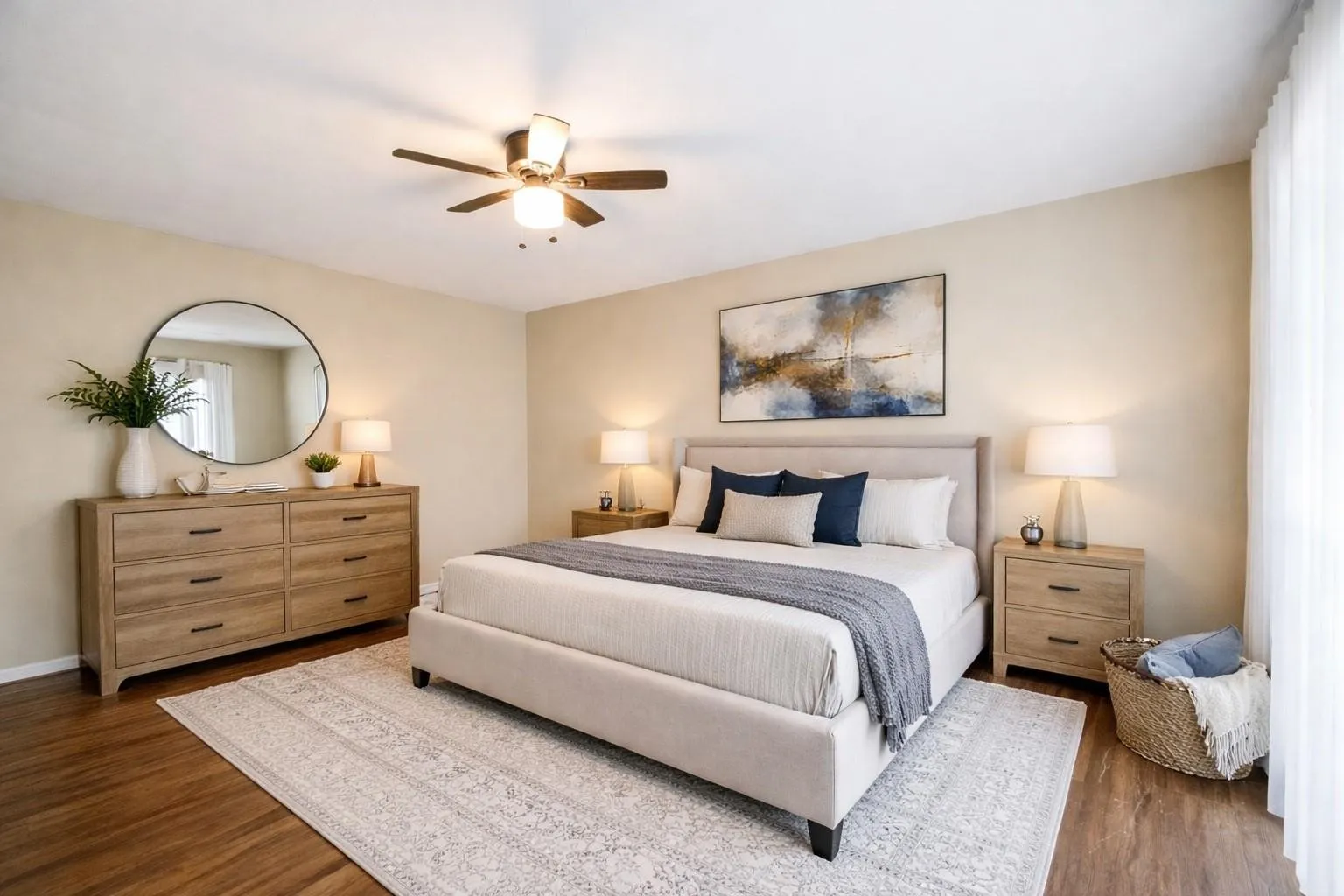 Serene and spacious primary bedroom, virtually staged with elegant furnishings to highlight comfort, natural light, and a relaxing retreat-like atmosphere.