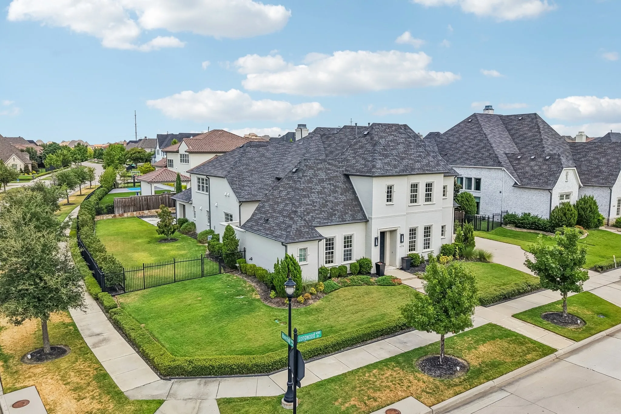 Corner lot across from community pool and sports courts