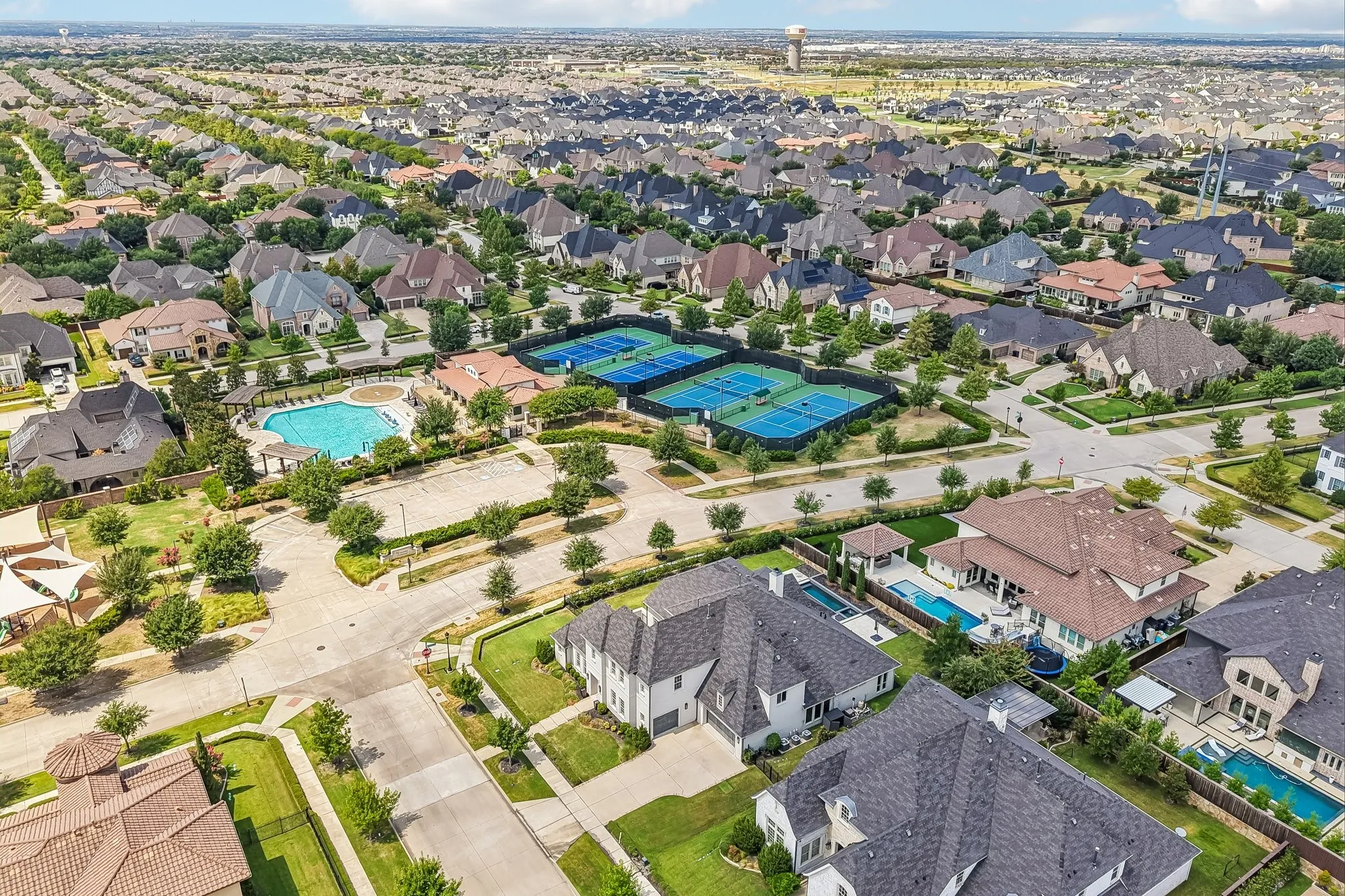 Corner lot across from community pool and sports courts