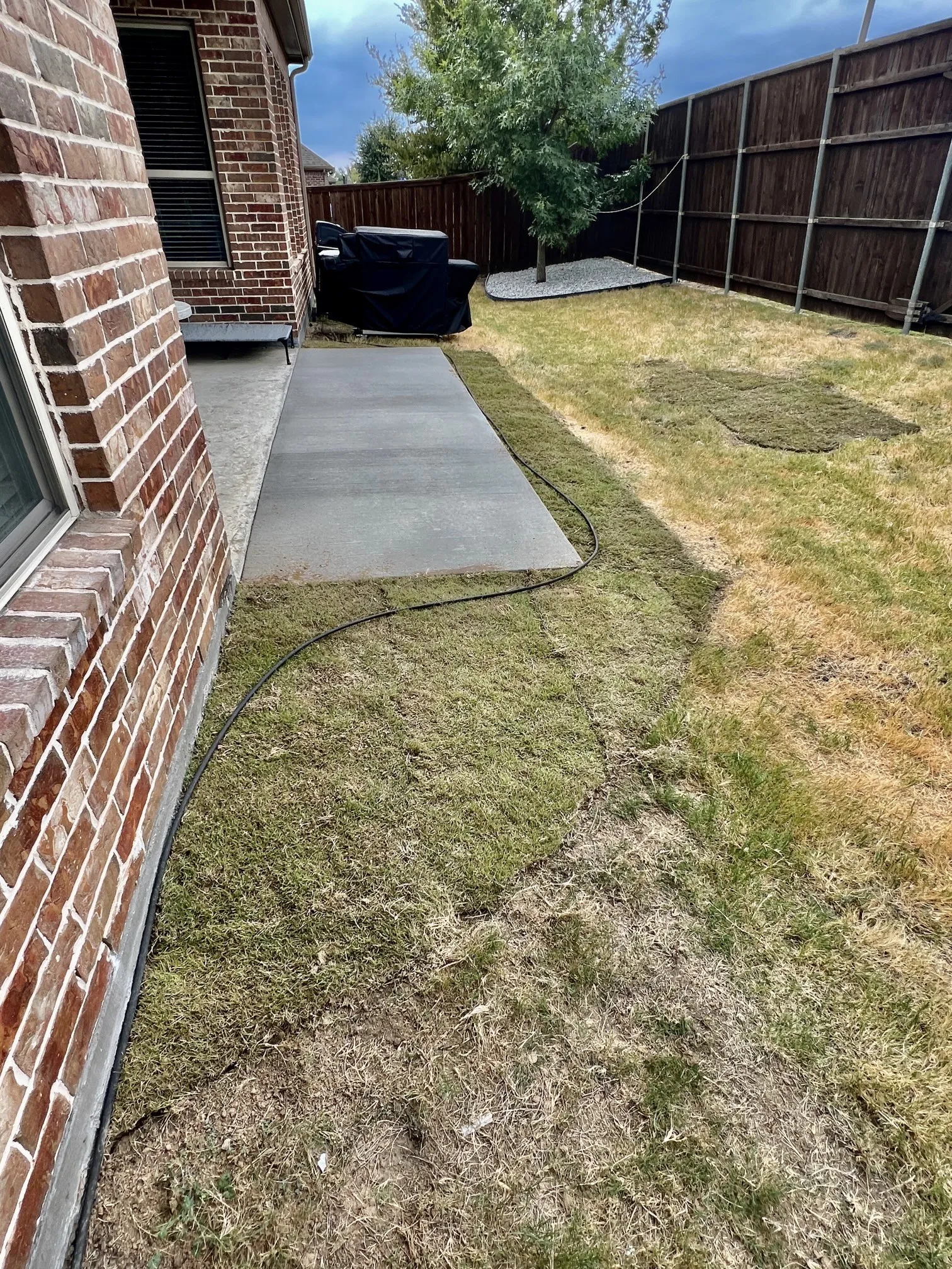 View of yard with extended patio area
