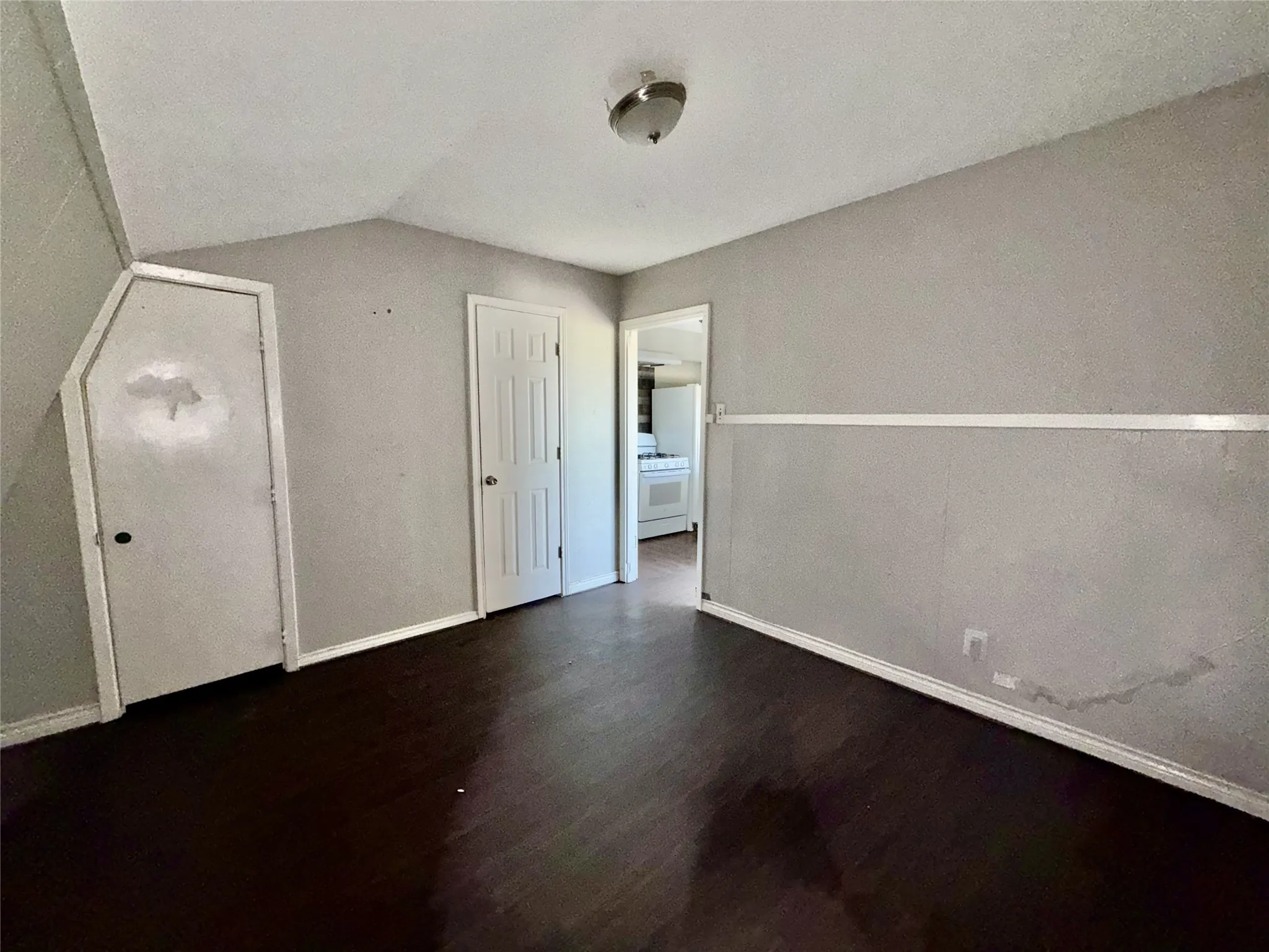Large bedroom with enough room for a sitting area.