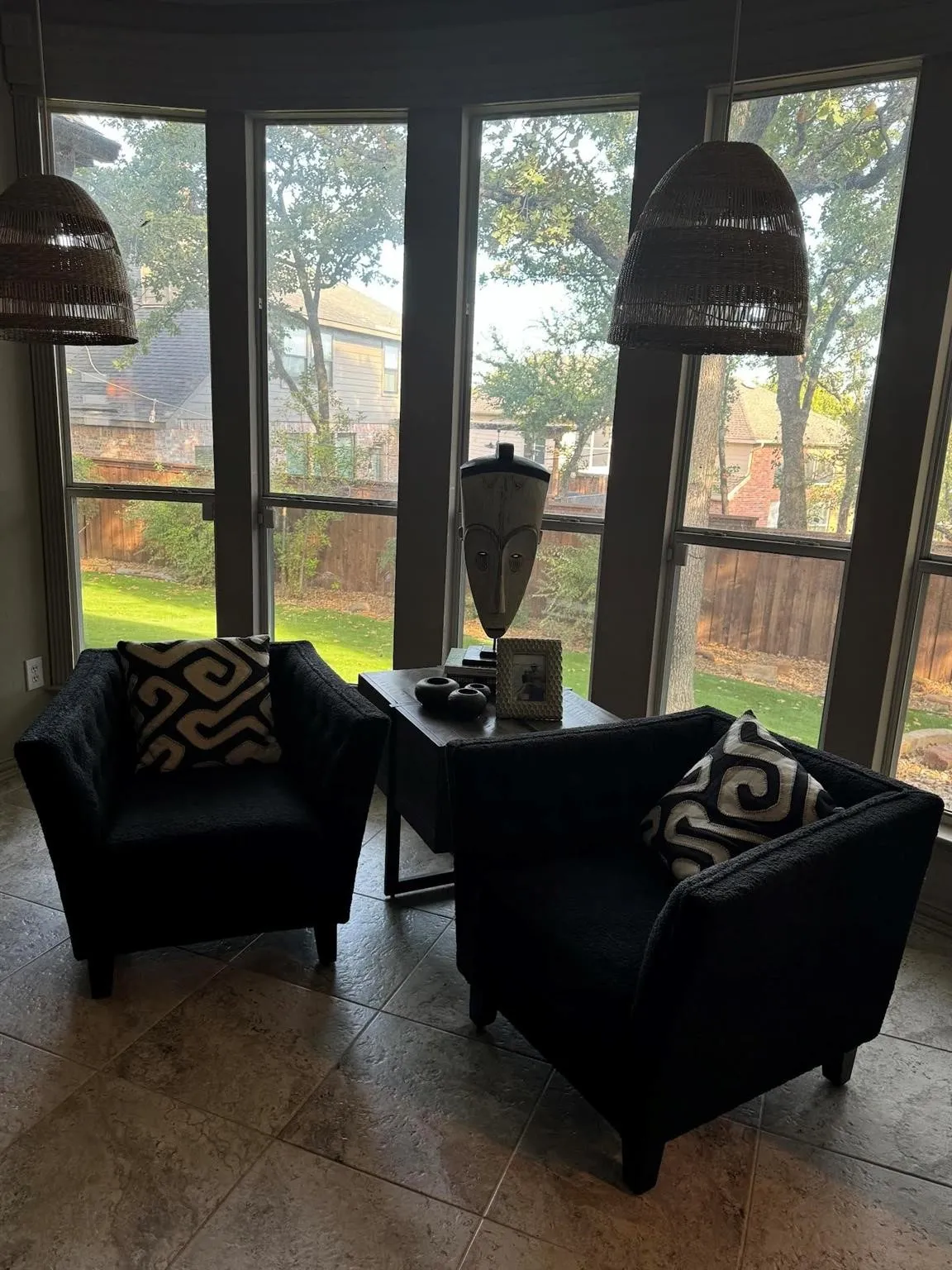 The flexible bonus space adjacent to the living room features bay windows and is perfect for a sitting area, piano, play space, or reading nook.