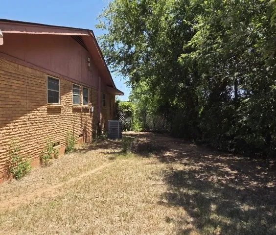 Brick exterior with multiple windows