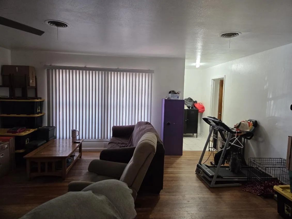 Hardwood flooring, recessed lighting, and a ceiling fan