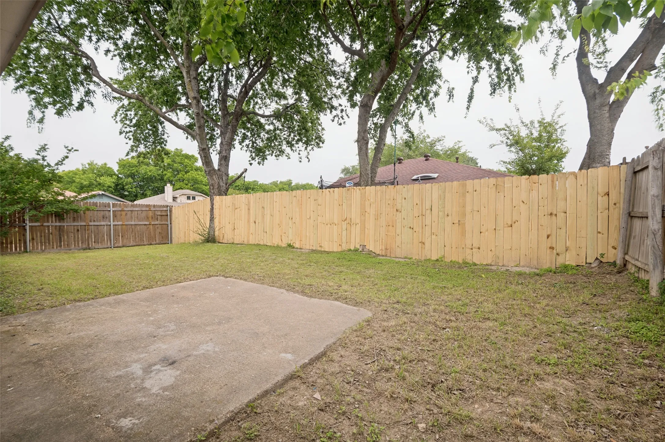 Large backyard with all new fence.