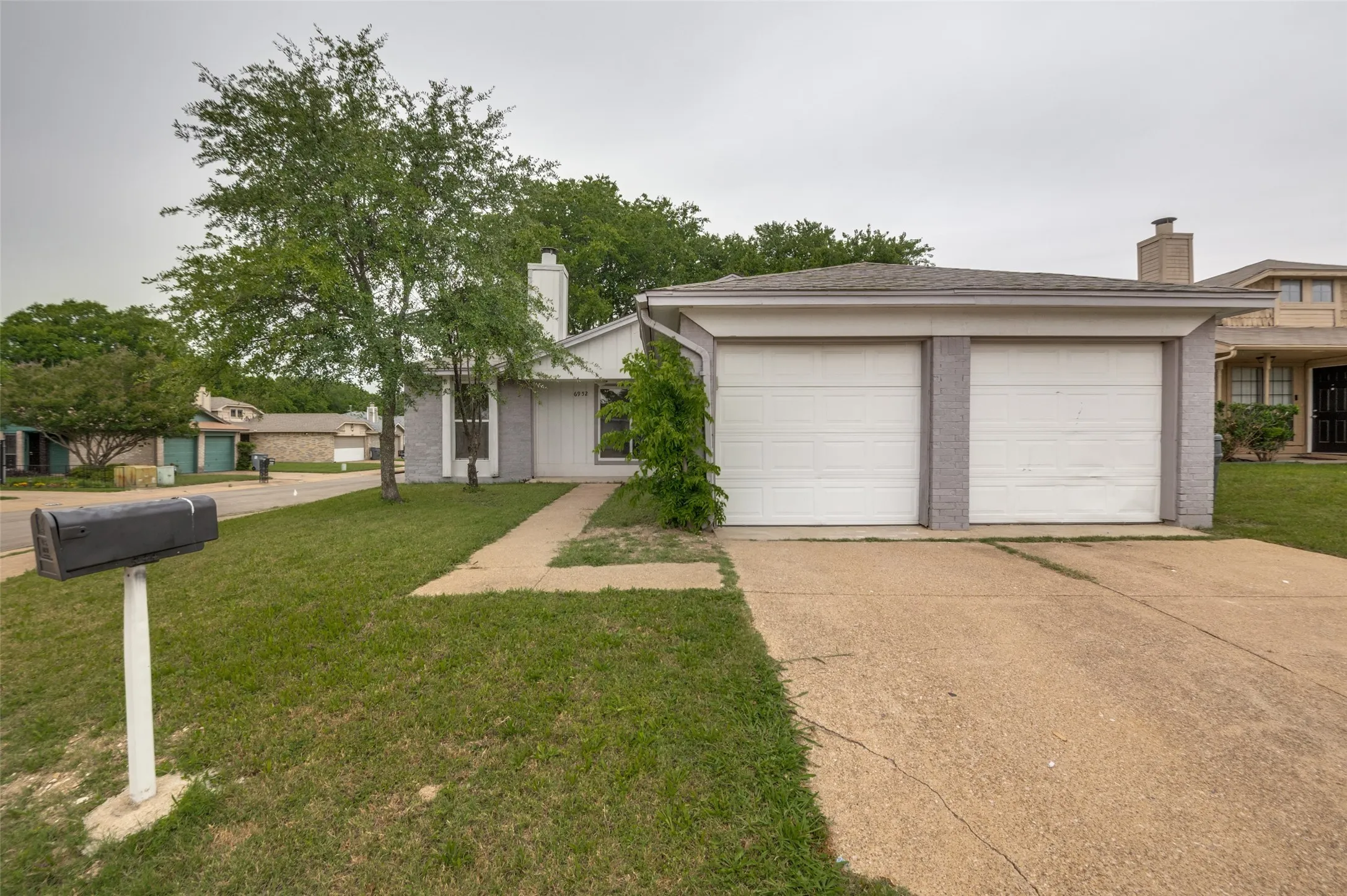 2 car garage + driveway.