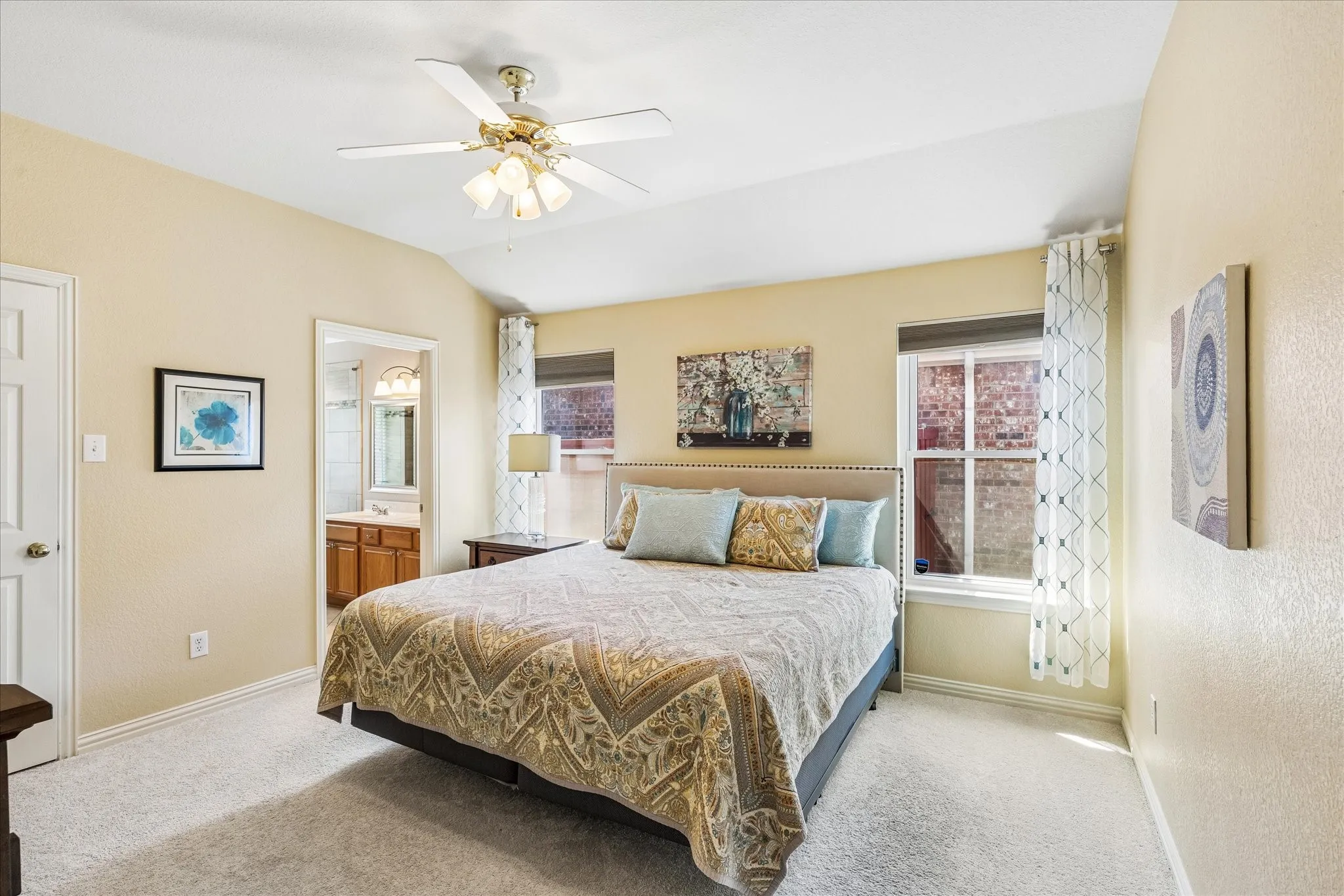 Primary bedroom is spacious with a large walk in closet.