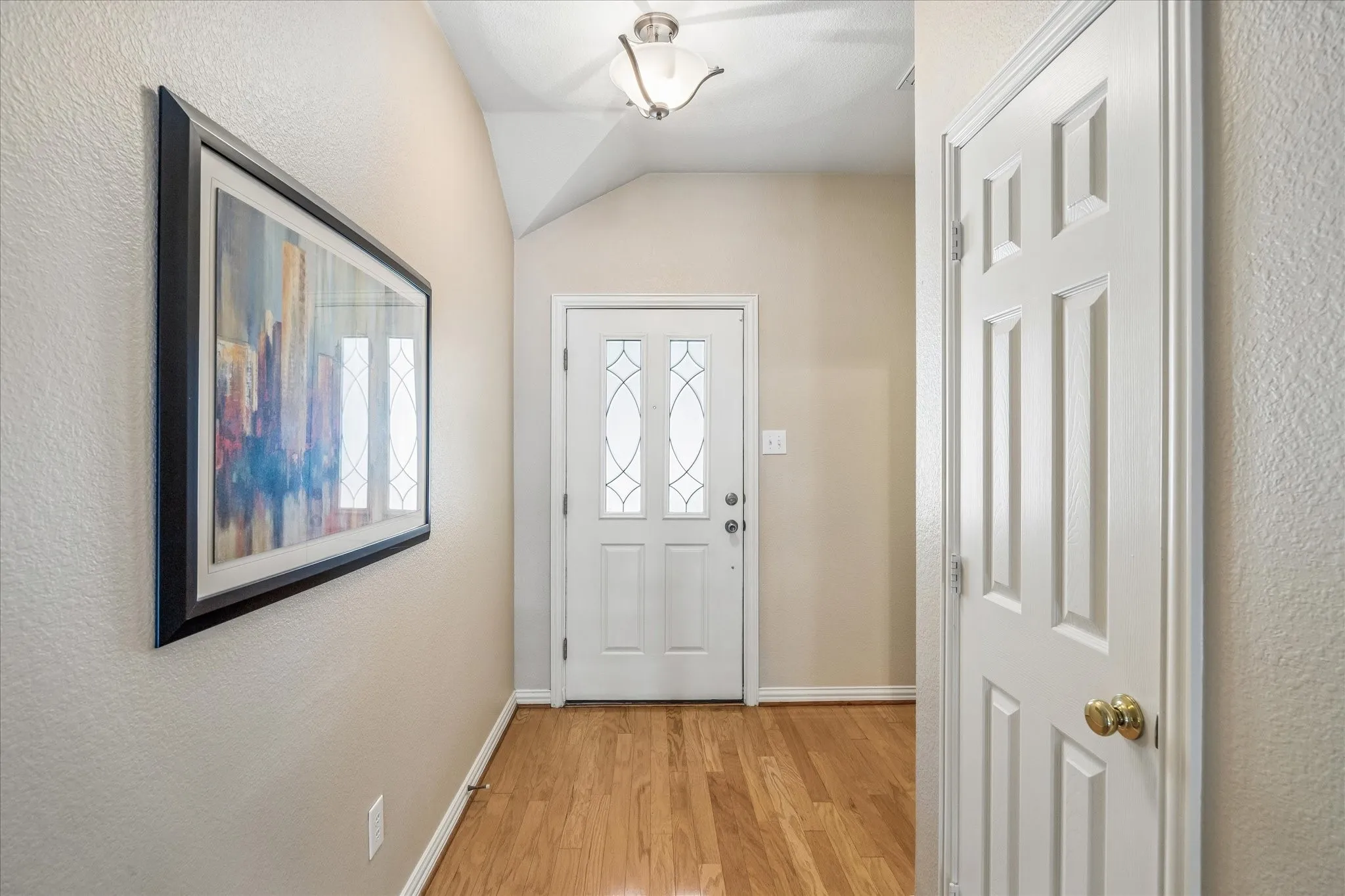 From the front door, the secondary bedrooms are to your left.