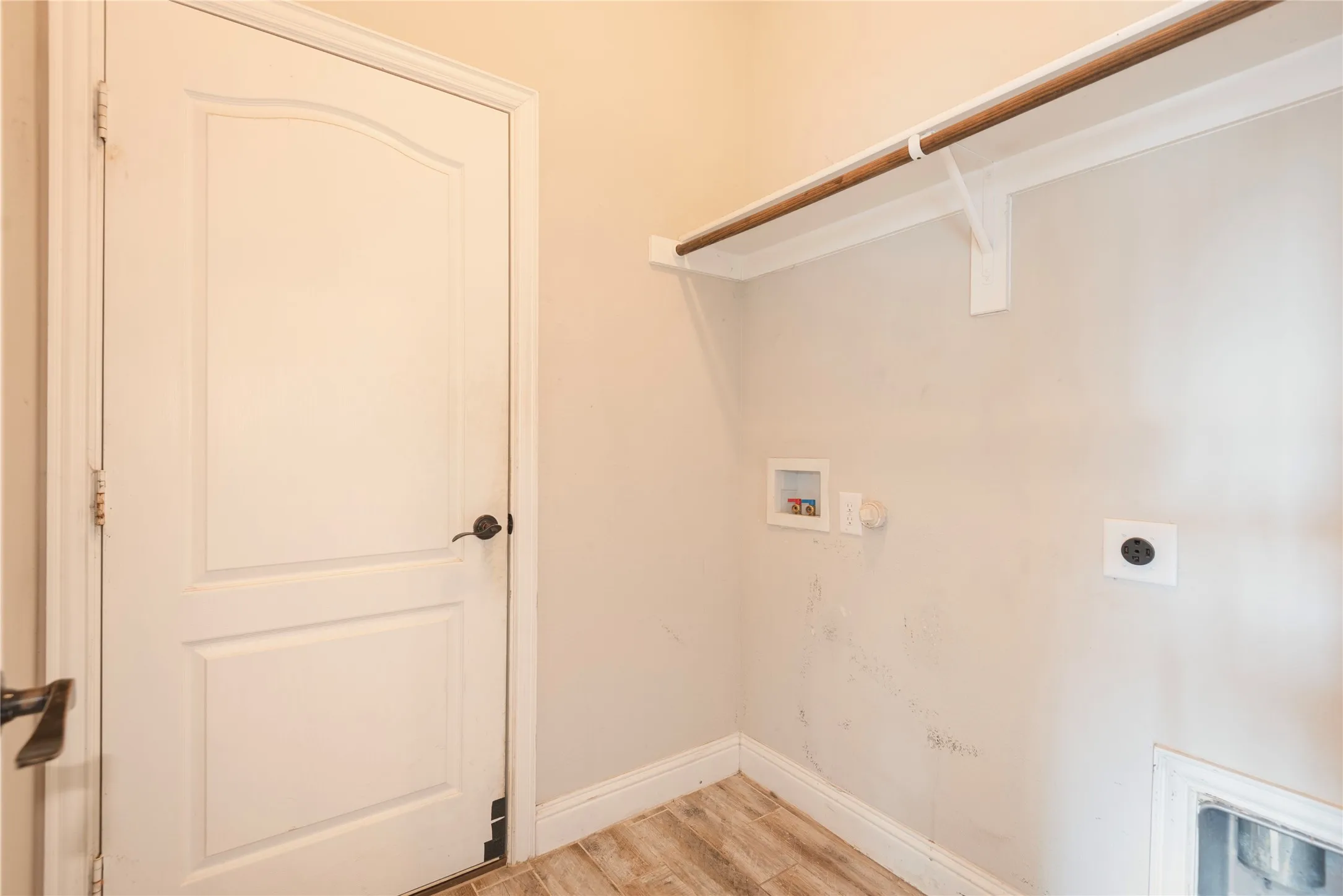 Wood-finish flooring with white trim