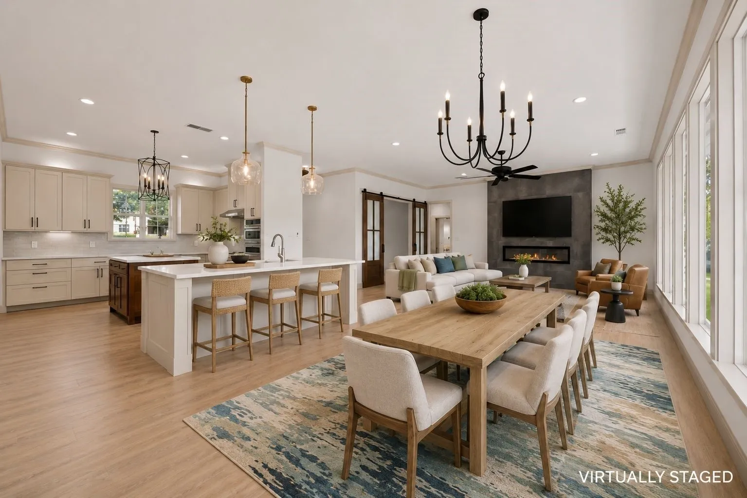 Virtually staged great room demonstrates the generous scale and entertaining potential of this modern farmhouse on Richland Chambers Lake.