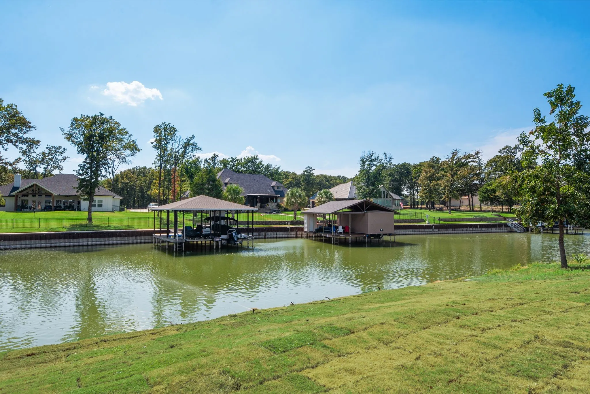 Peaceful canal waterfront views highlight the relaxed Richland Chambers Lake lifestyle surrounding this home in The Shores.