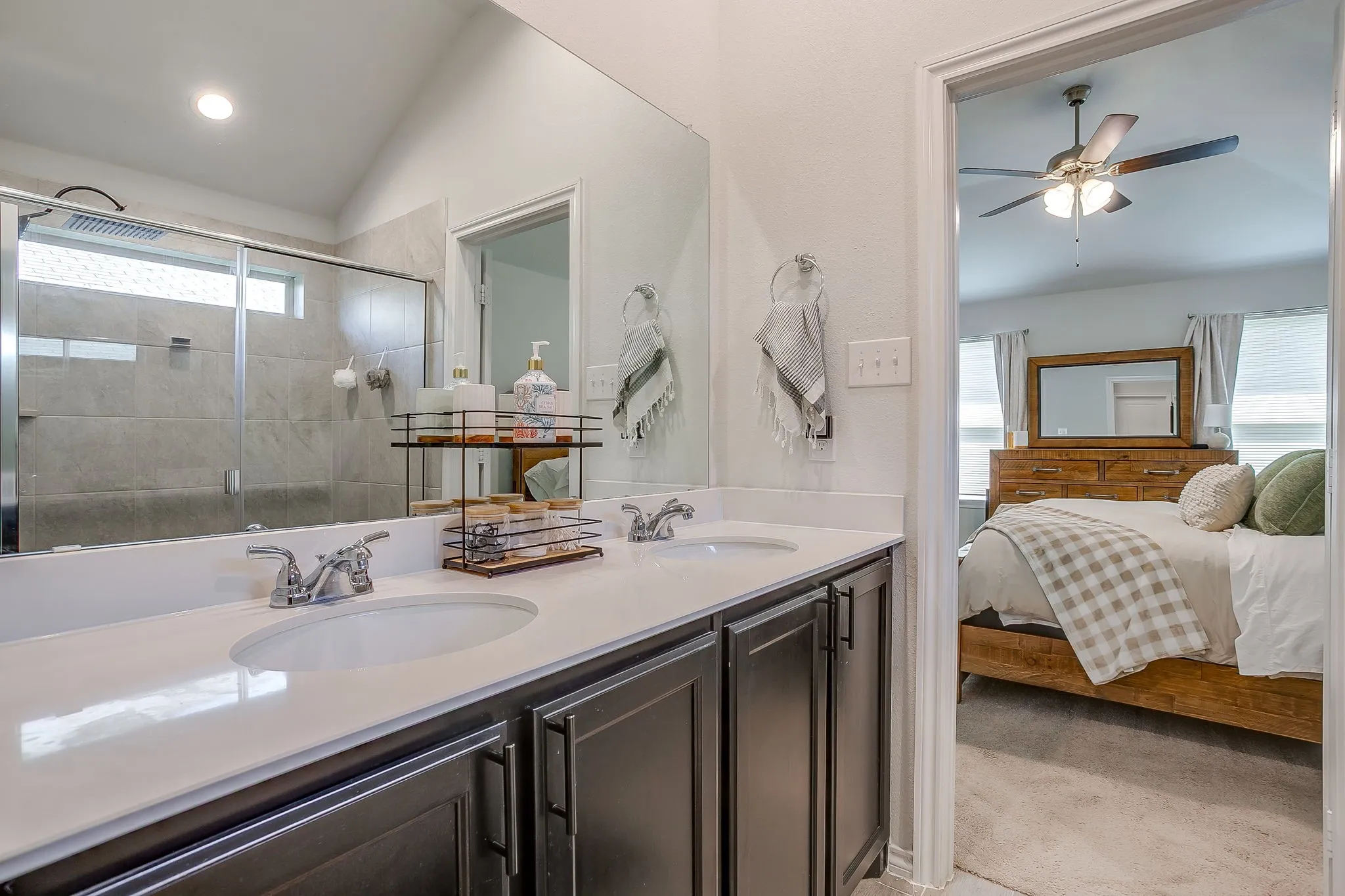 Double vanity with integrated sinks and chrome fixtures