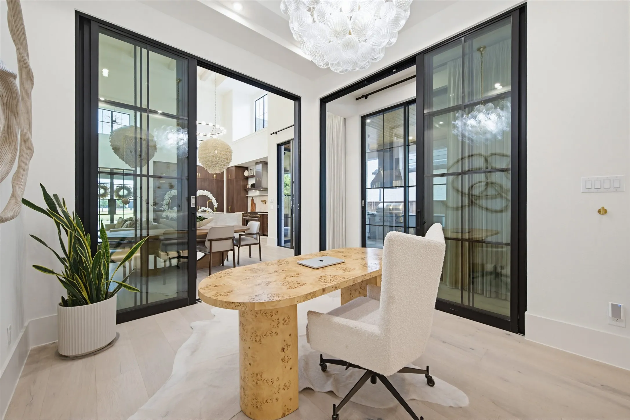 Interior office with sliding glass doors.