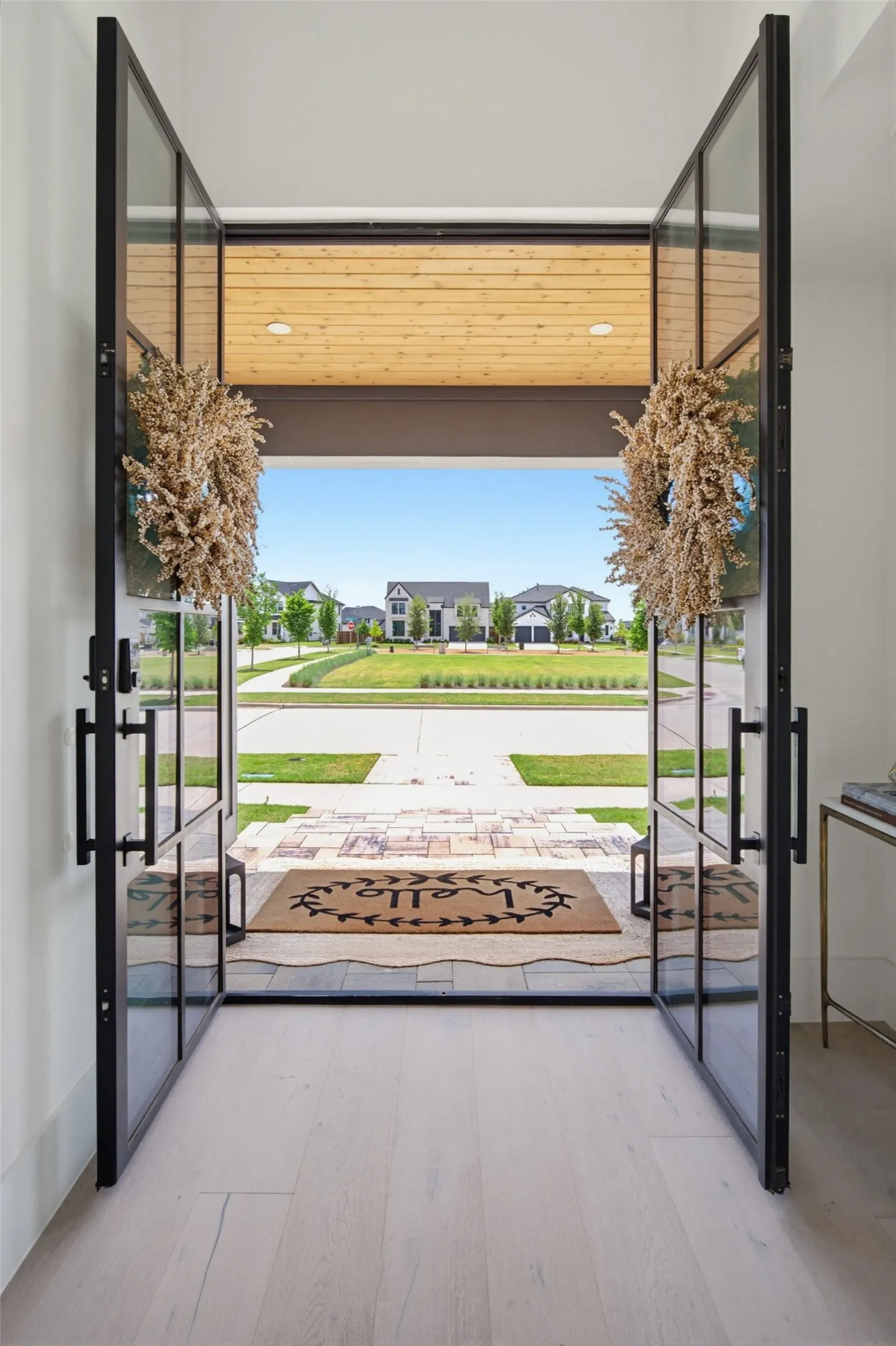 Grand front doors welcome you to this stunning home.