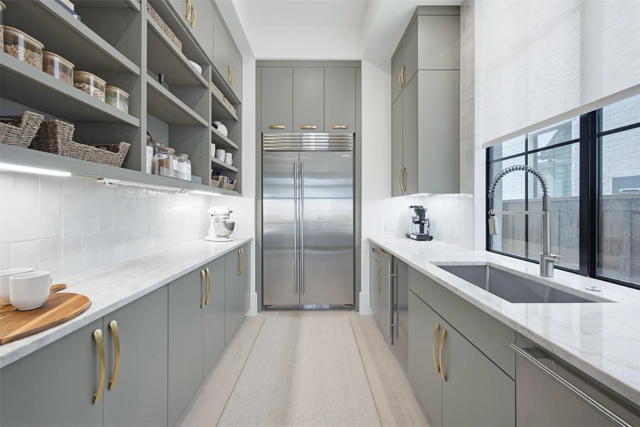 Prep Kitchen with additional Sub-Zero refrigerator and double ovens.