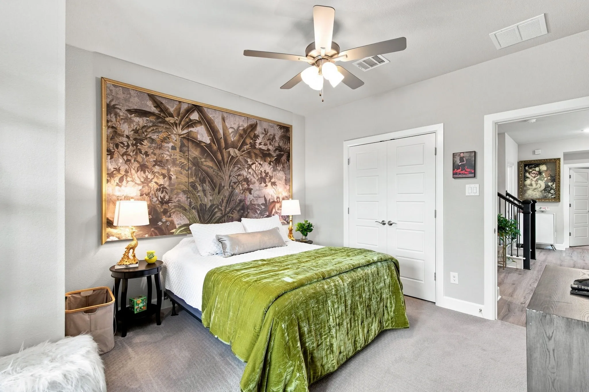 Recessed lighting, ceiling fan, double panel doors, soft gray wall paint, and gray carpeting