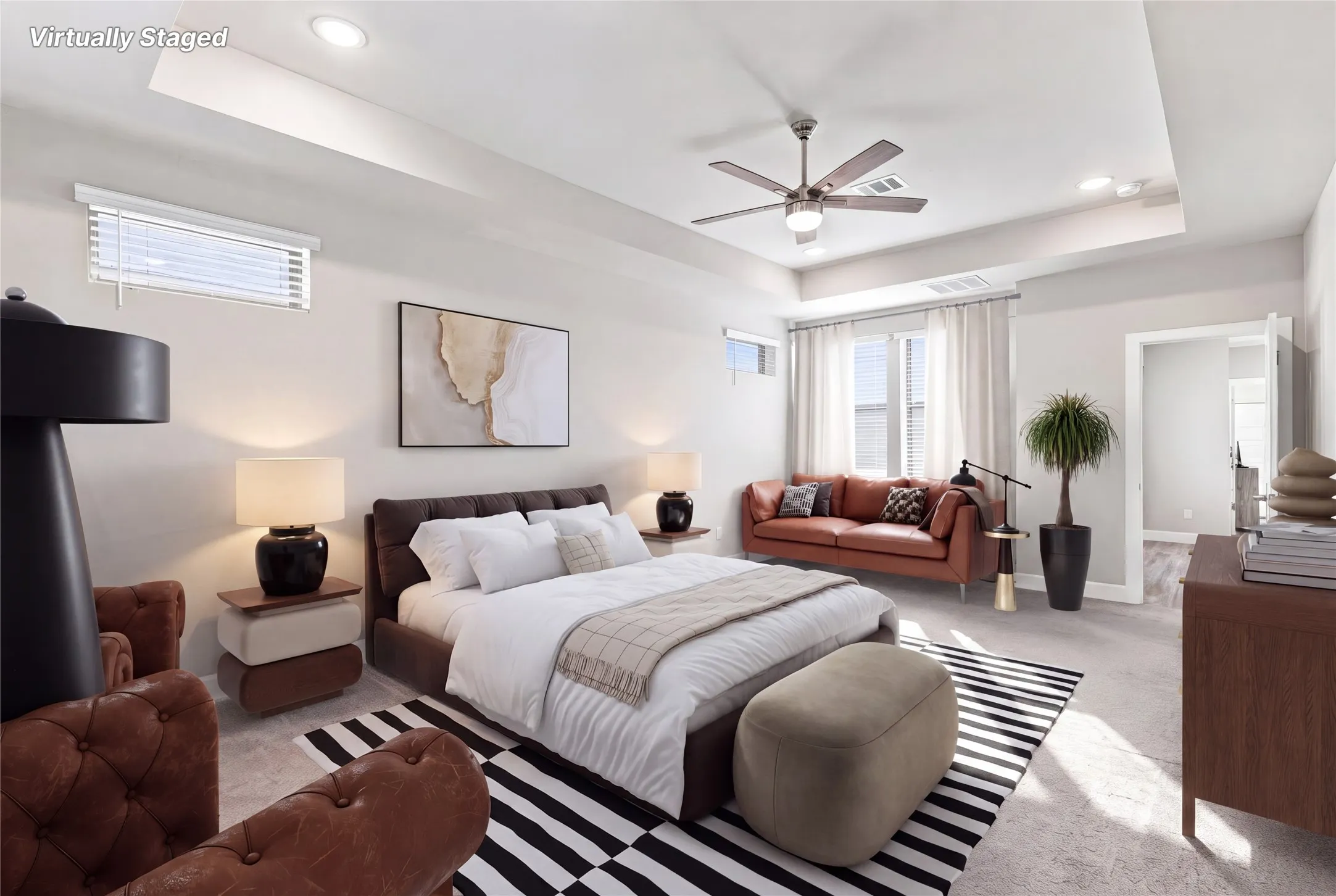 Oversized primary bedroom with flexible living space
