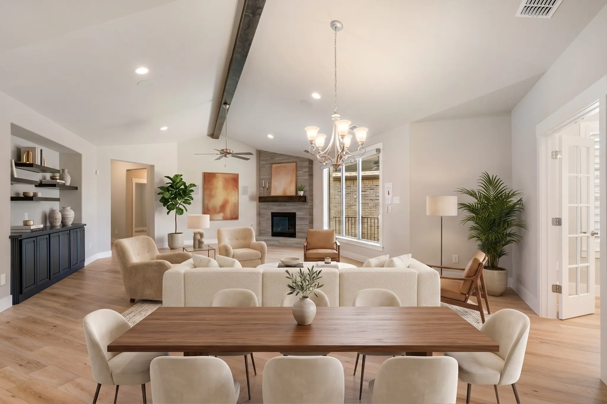 Spacious den open to dining and kitchen.