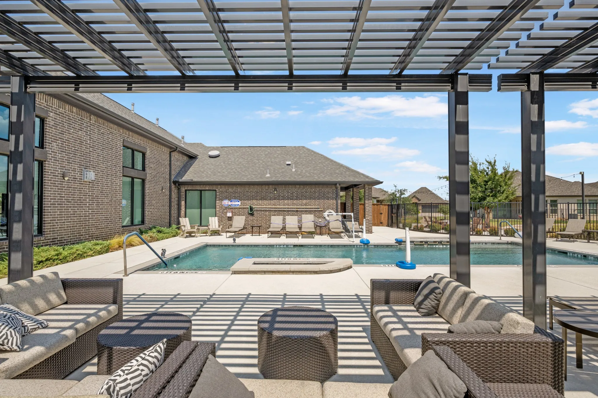 Covered pool side seating areas.