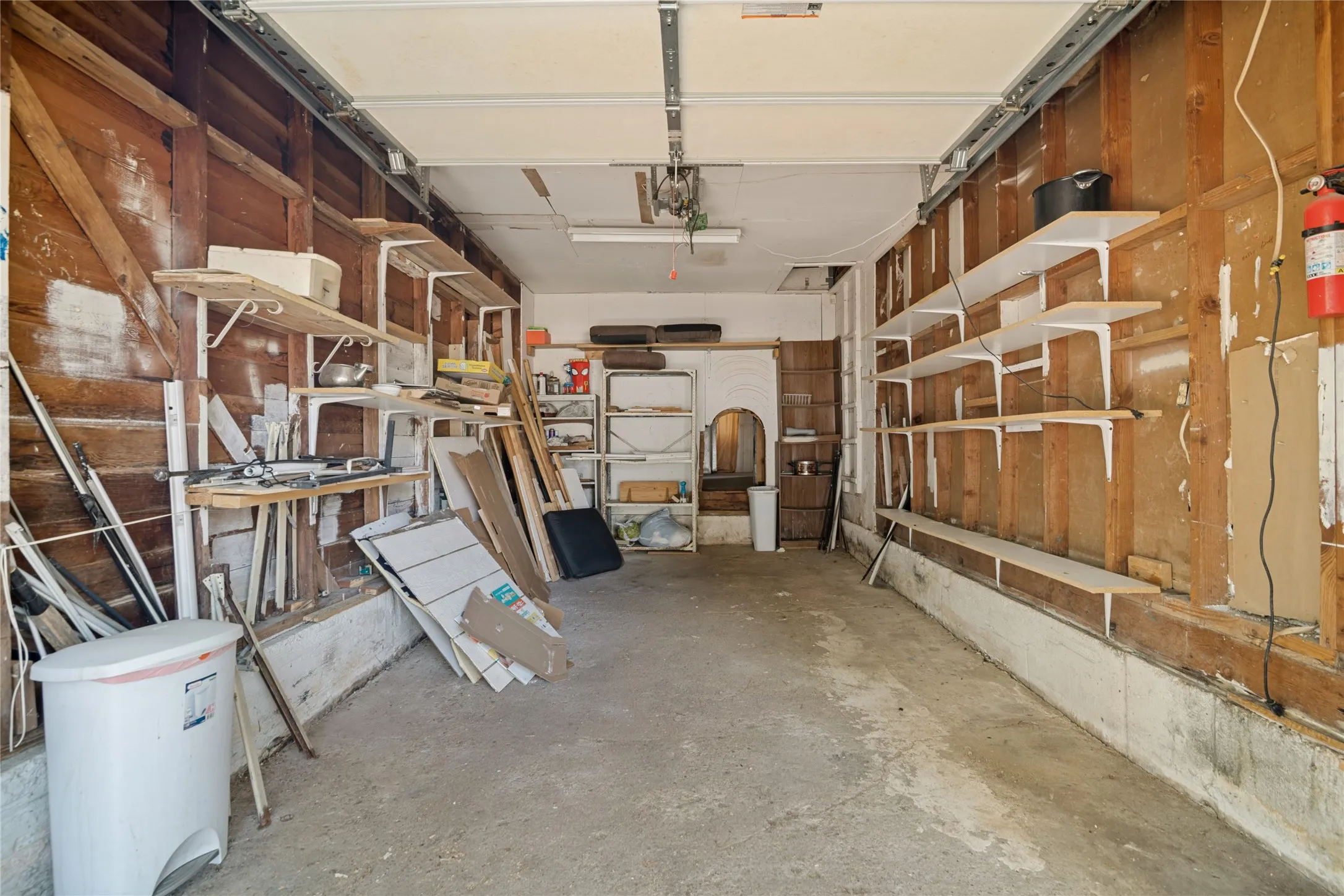 One Car garage with storage shelving